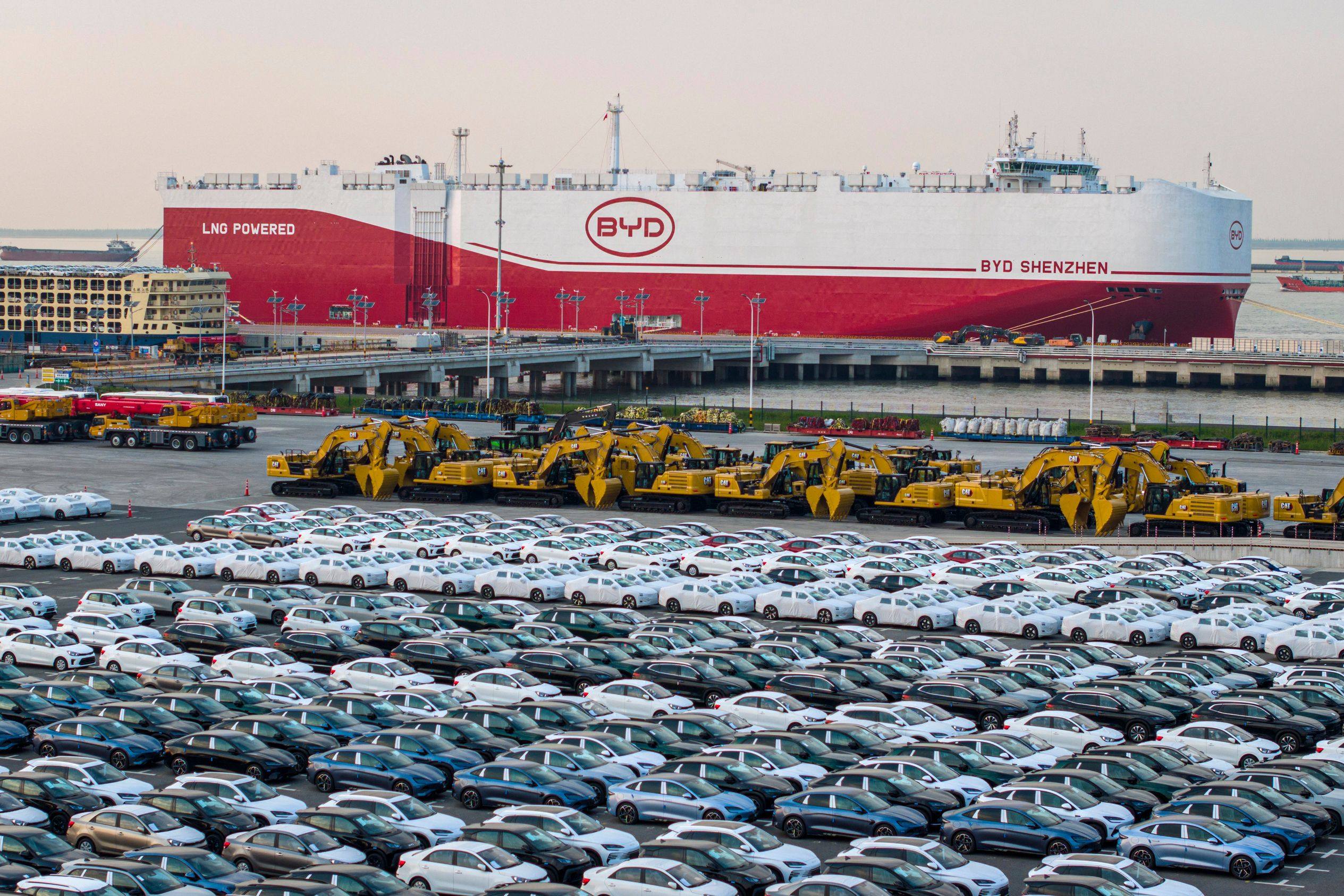Electric cars made by the Chinese brand BYD are stacked ready to be loaded onto a cargo ship for export at a port in China’s eastern Jiangsu province. Photo: AFP