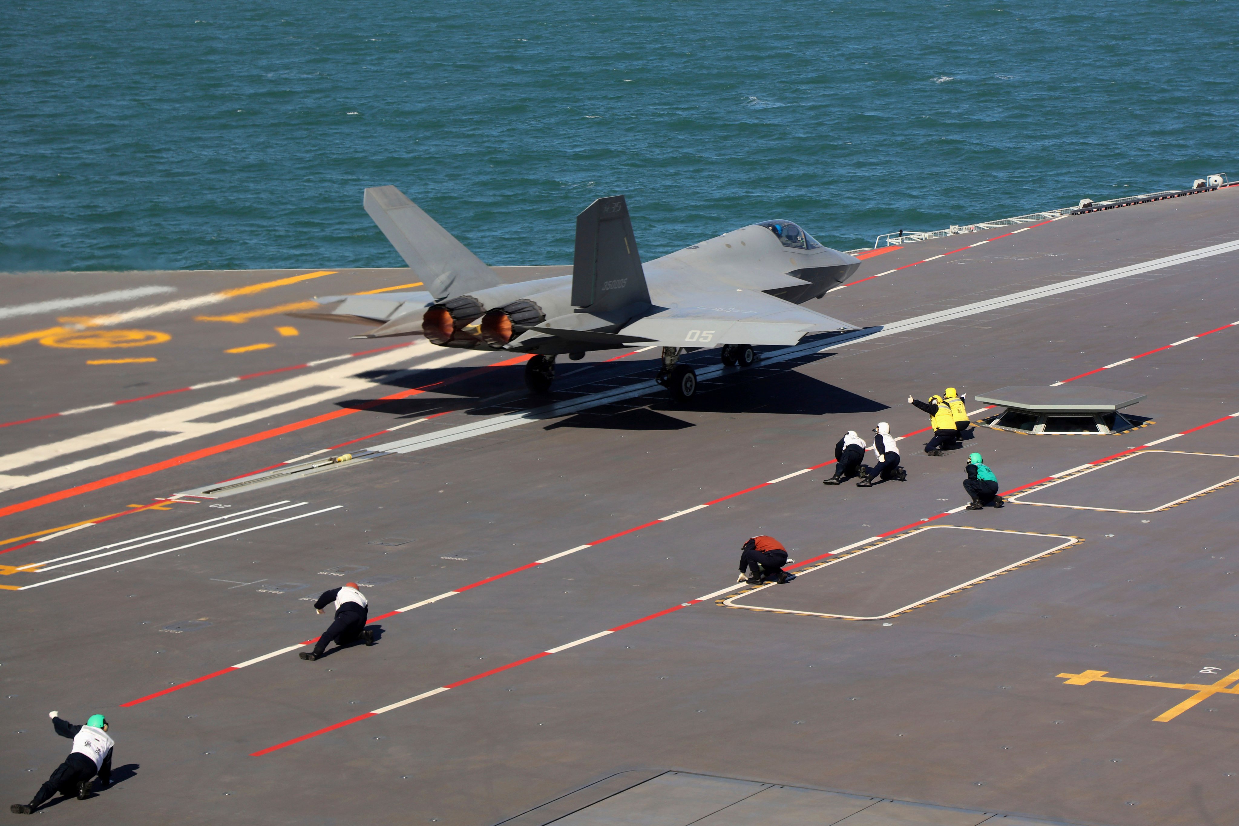 In this undated photo released on Tuesday by Xinhua, a J-35 stealth fighter jet takes off from the Fujian, a Chinese aircraft carrier, at an undisclosed location. Photo: Xinhua via AP