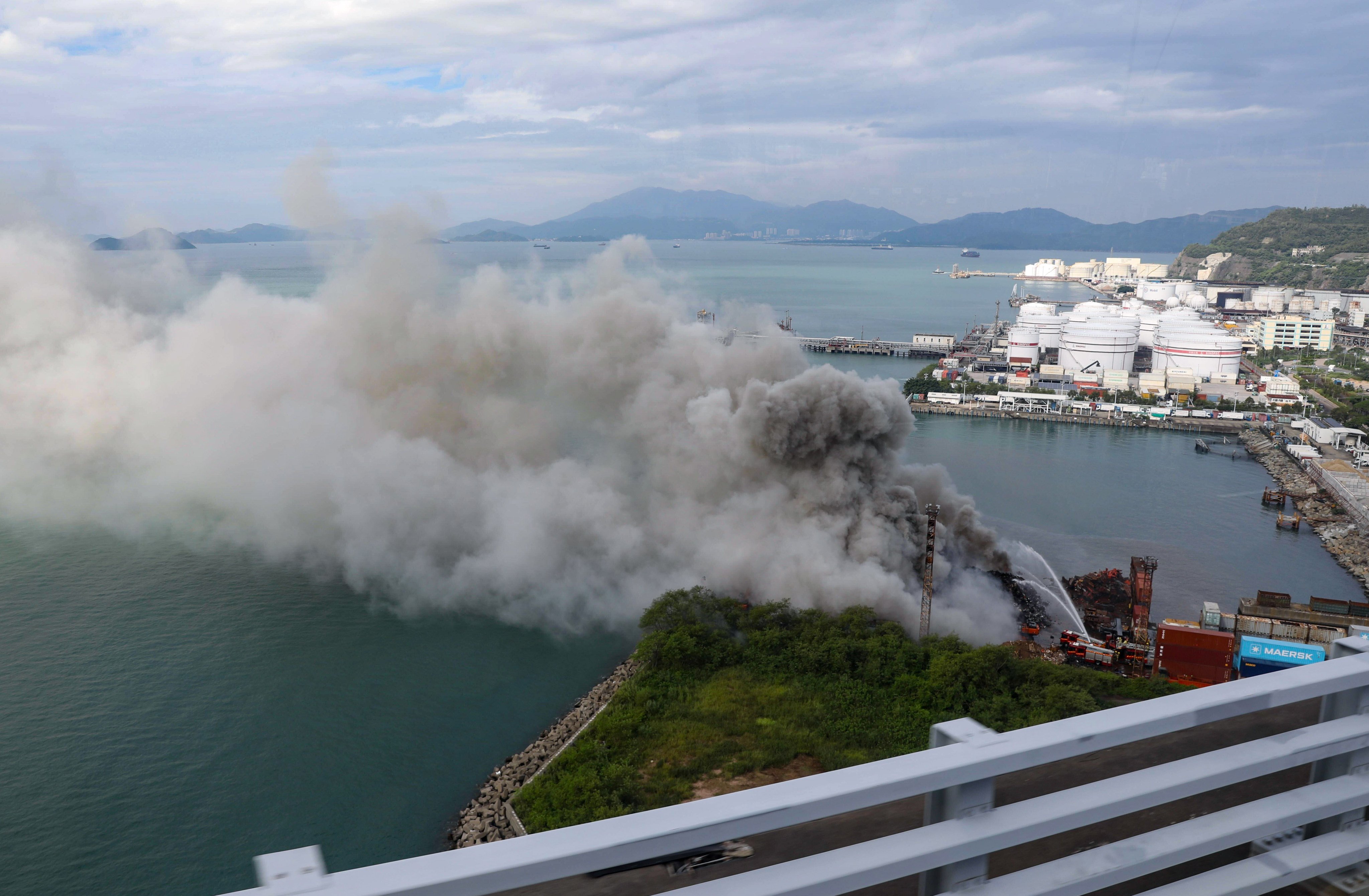 A fire has broken out at a recycling site in Tsing Yi near Stonecutters Bridge. Photo: Sun Yeung