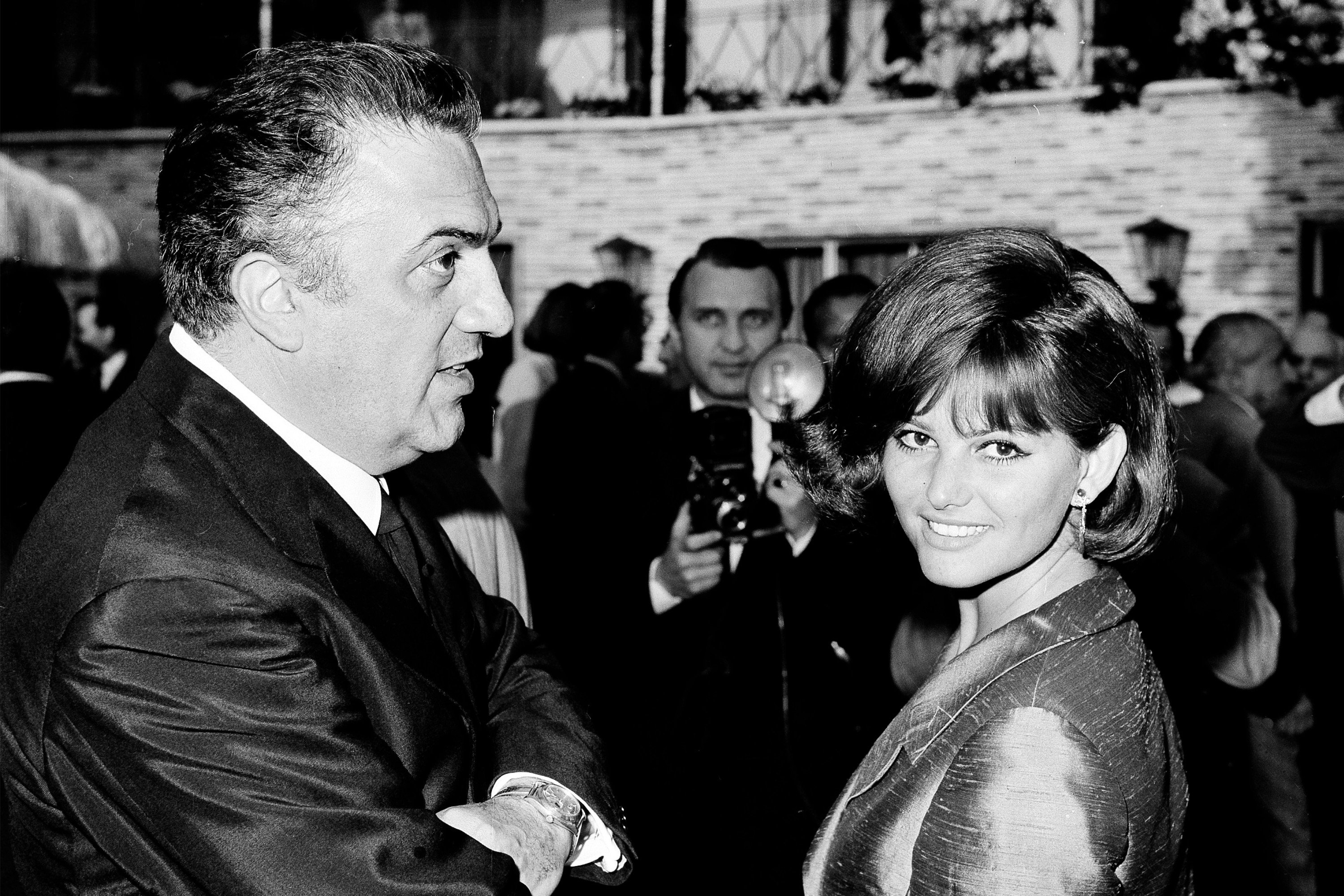 Italian actress Claudia Cardinale (right) and Italian film director Federico Fellini appear during an Academy Awards ceremony in Rome on May 27, 1964. Photo: AP Photo