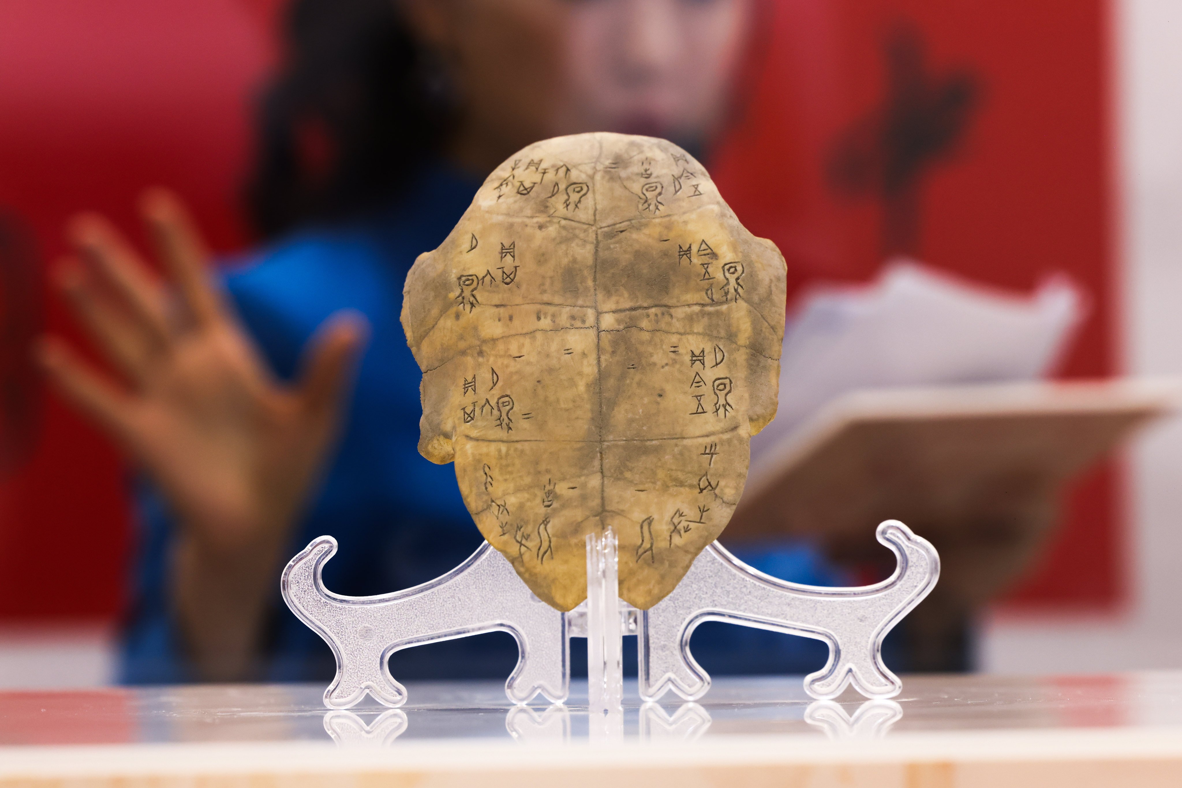 A Chinese oracle bone from the Shang dynasty (1600BC-1046BC) at Hong Kong’s Chinese Culture Festival 2025. Inscriptions on these bones are the most ancient form of written Chinese ever found. Photo: Nora Tam