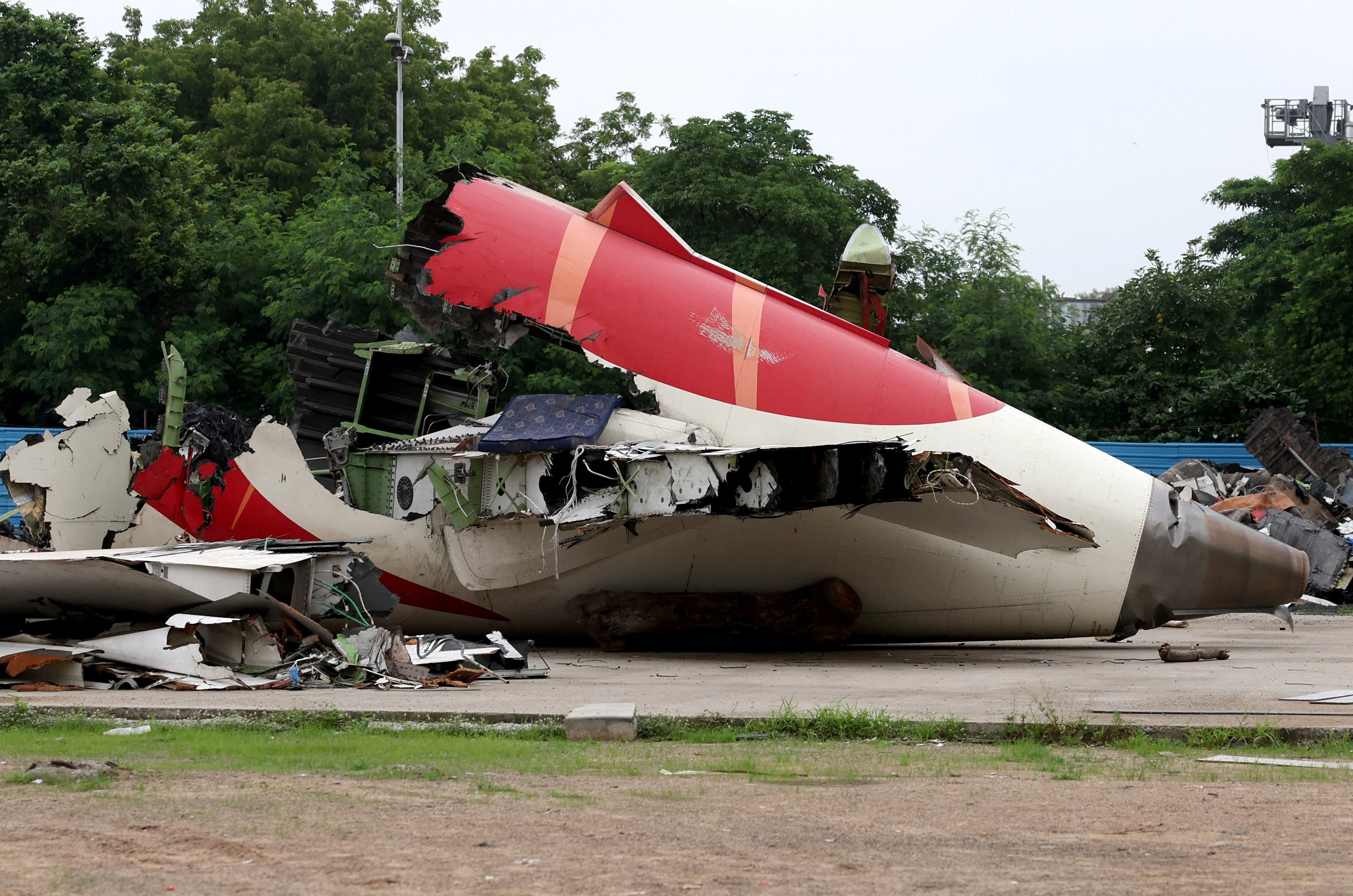 Wreckage of the Air India Boeing 787-8 Dreamliner plane sits on the open ground, outside Sardar Vallabhbhai Patel International Airport, where it took off and crashed in Ahmedabad, India in July. Photo: Reuters