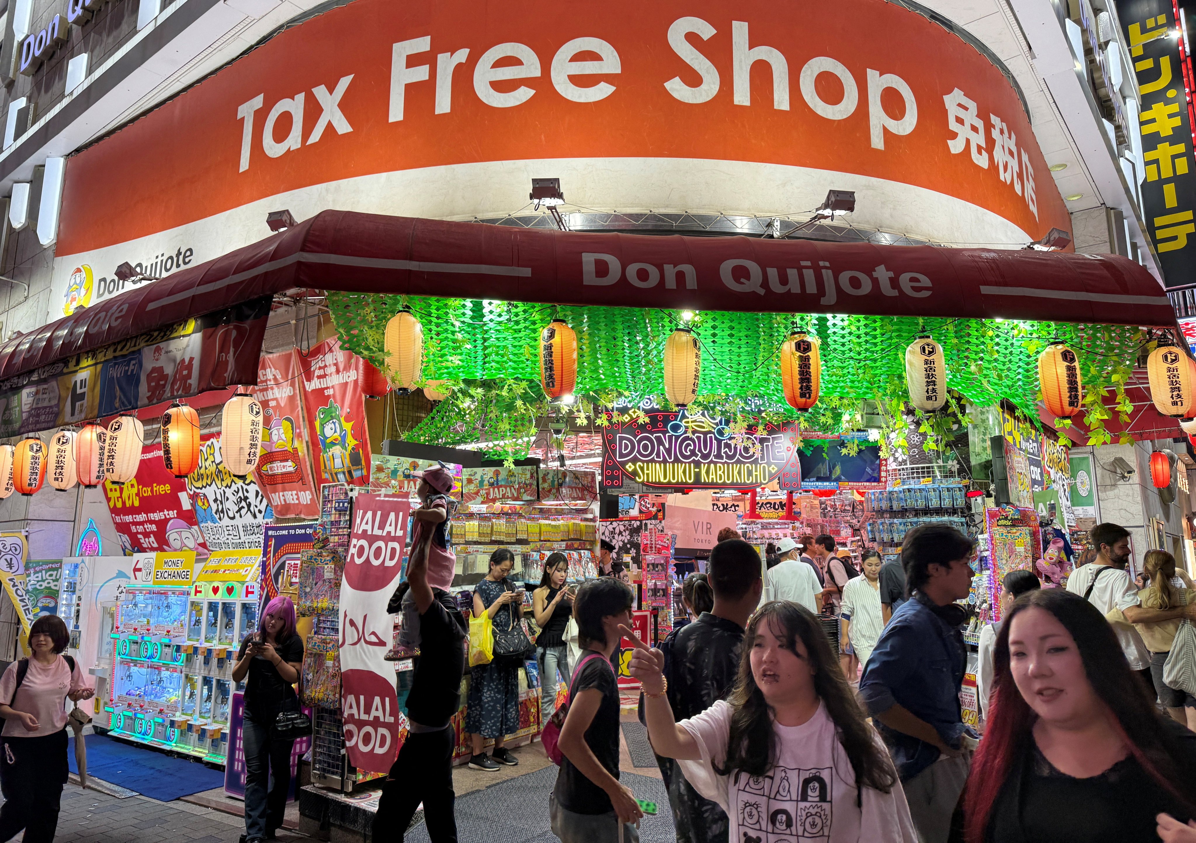People walk in a shopping area in Tokyo’s Shinjuku on September 11. Japan is experiencing cost-push inflation – price rises driven by the weak yen and exacerbated by the cost of imported raw materials, food and energy. Photo: Reuters