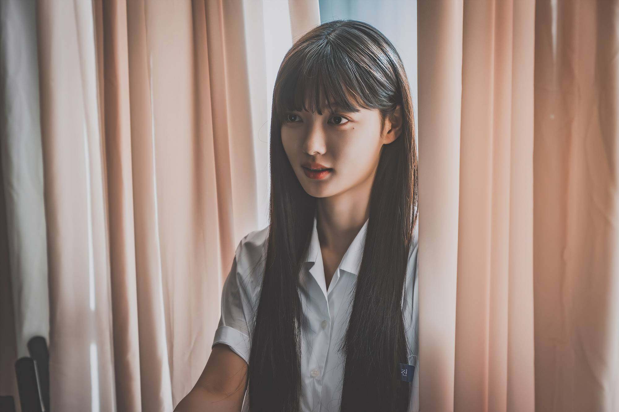 Kim Yoo-jung as Baek A-jin, a ruthless femme fatale who manipulates people to get what she wants, in a still from the new Korean drama Dear X.
