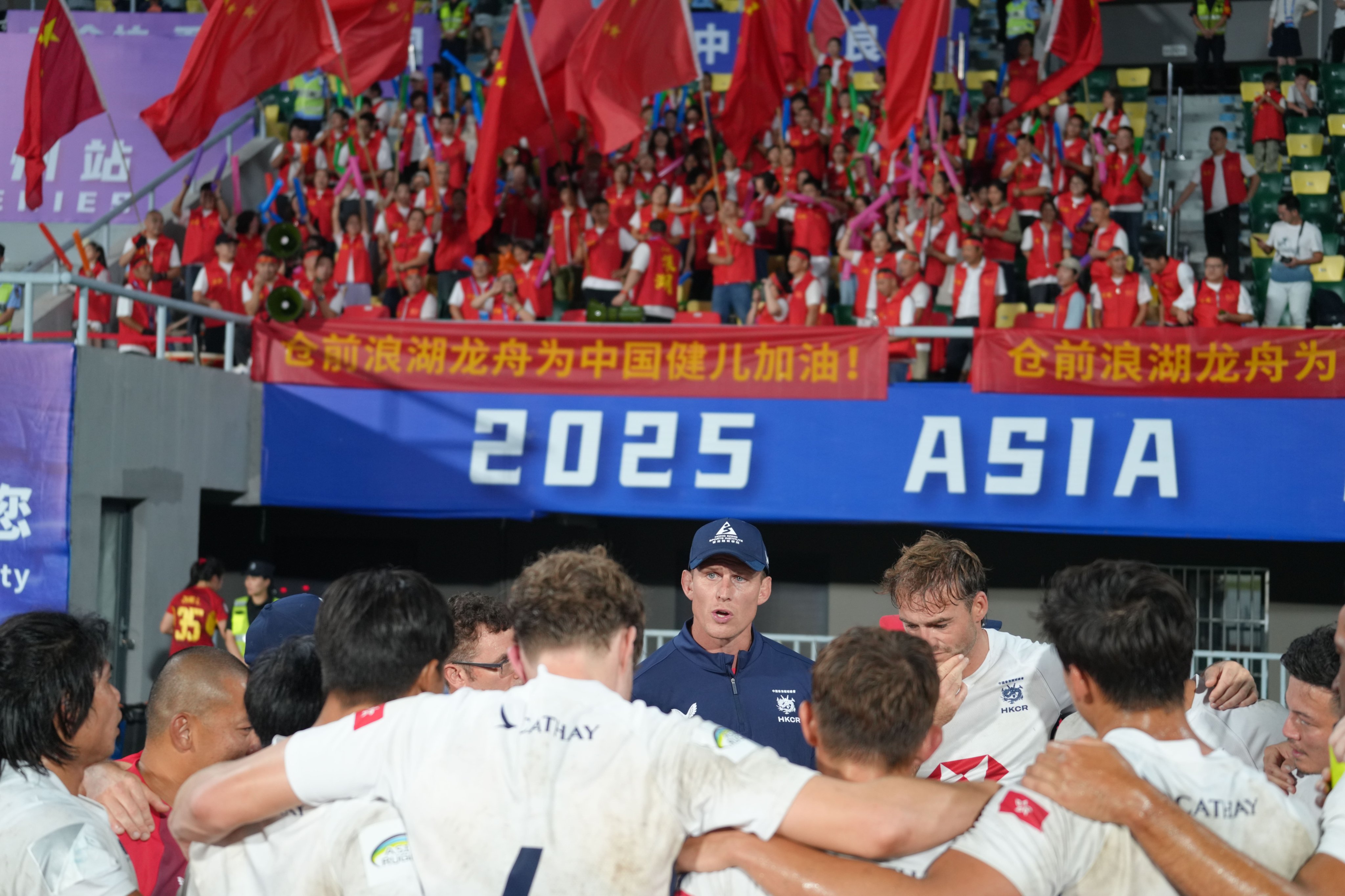 Jevon Groves addresses his players during the opening Asia Rugby Sevens Series leg in Hangzhou. Photo: Hong Kong, China Rugby