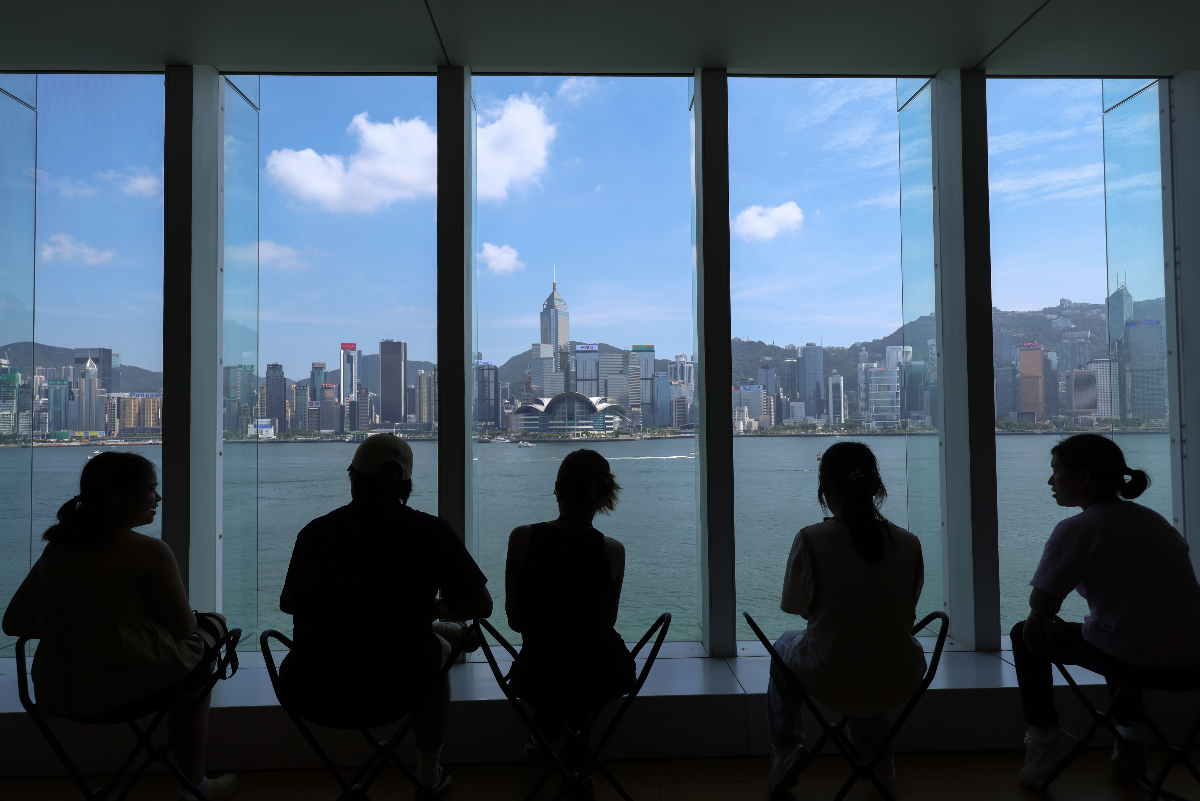 People enjoy the view of Victoria Harbour from inside the Hong Kong Museum of Art on August 8. Photo: Jelly Tse