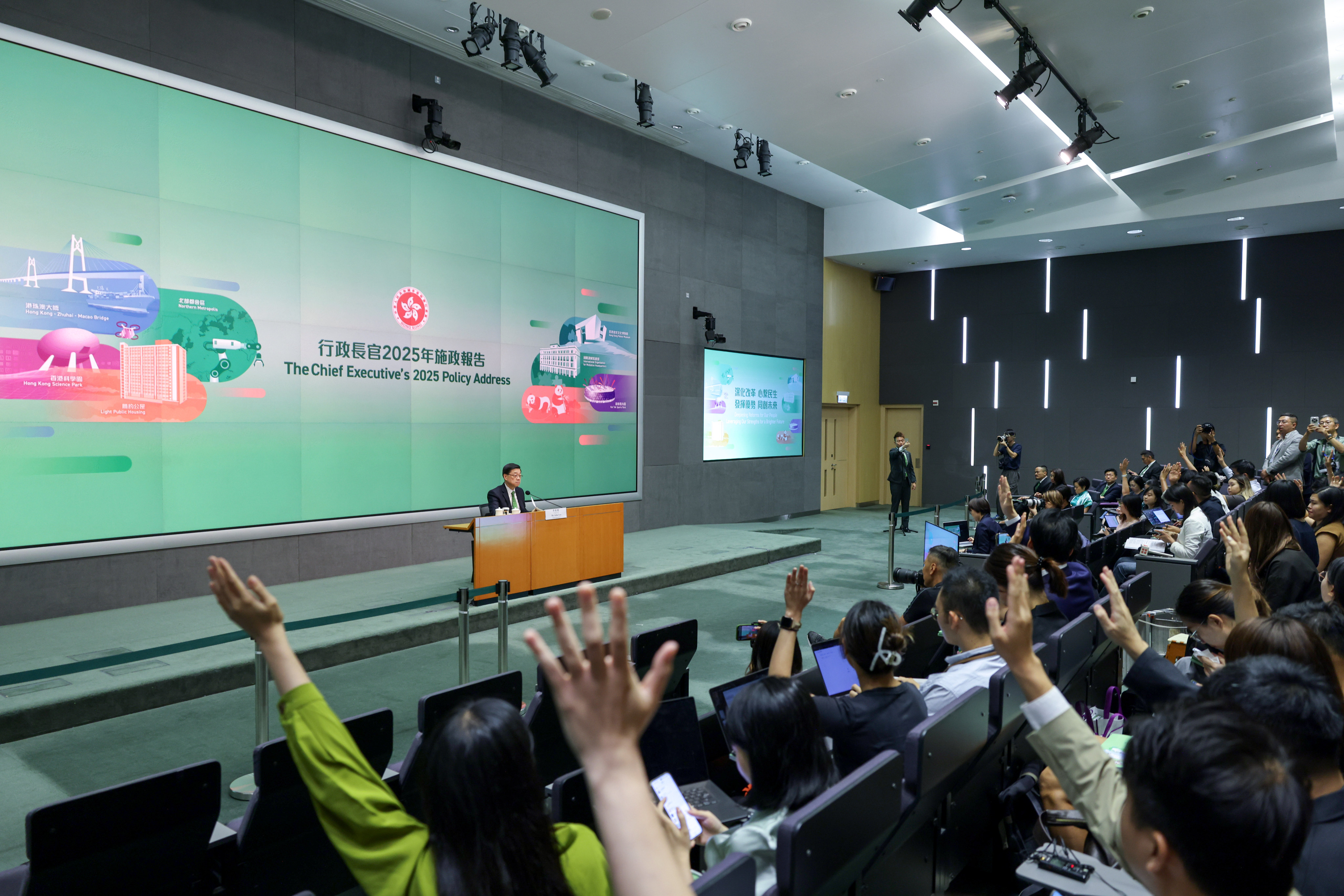 Journalists raise their hands to ask questions as Hong Kong Chief Executive John Lee Ka-chiu explains his policy address at a press conference on September 17. Photo: Nora Tam