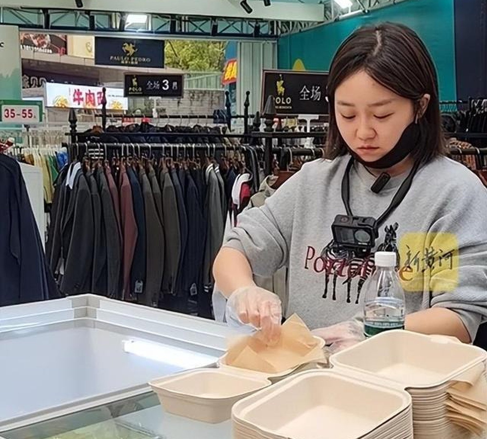 Chen Meilin now works selling baked goods, helped by her new man, at a local market. Photo: Handout