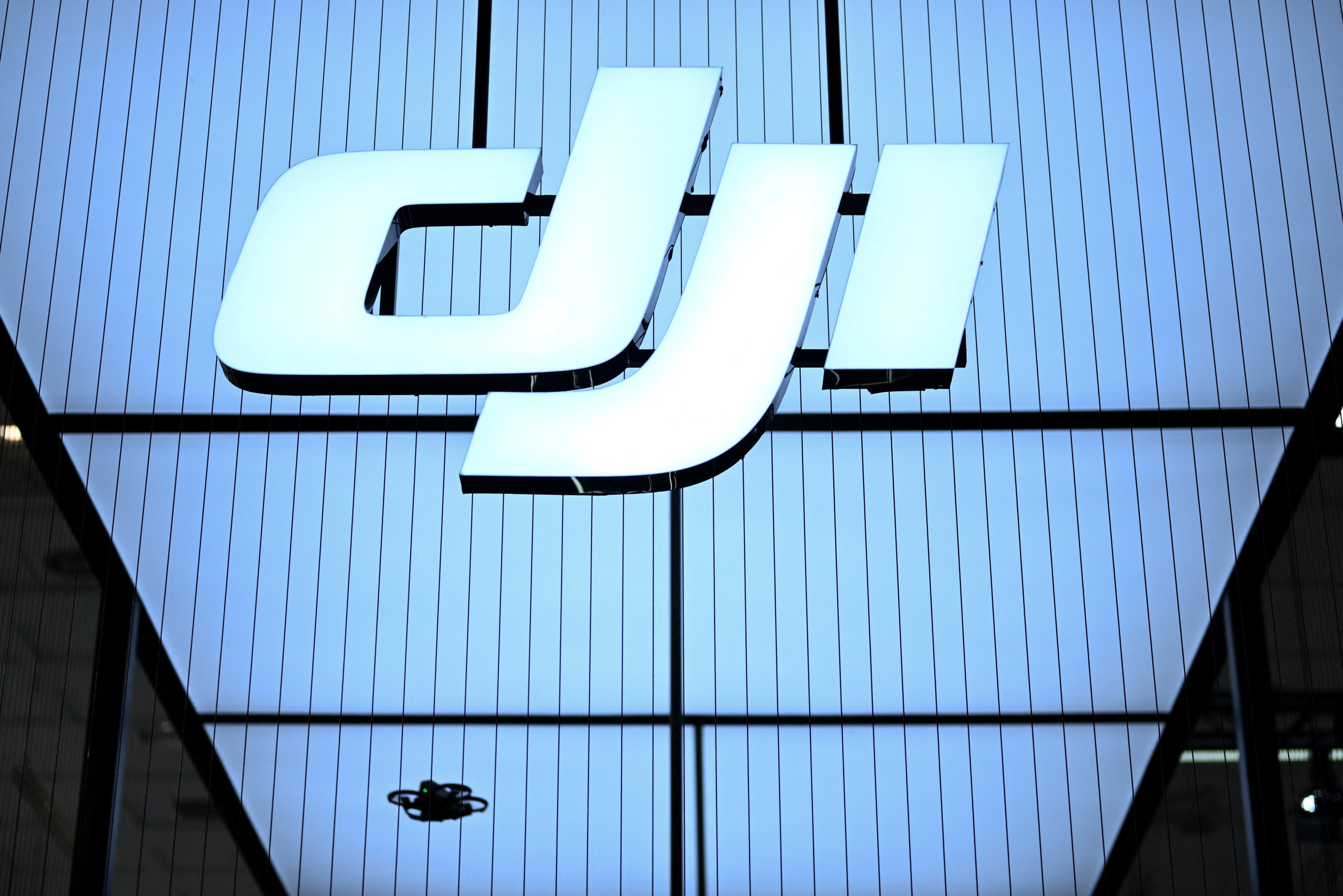 The DJI logo is displayed at the Innovation for All trade fair in Berlin earlier this month. Photo: Reuters