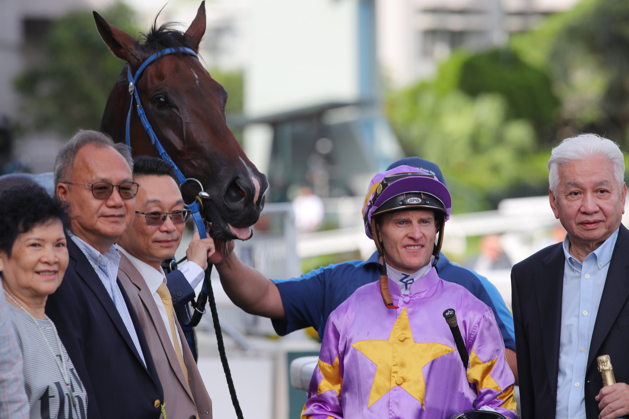 Jockey Zac Purton celebrates with owner Ko Kam-piu (right) after Little Paradise’s win.