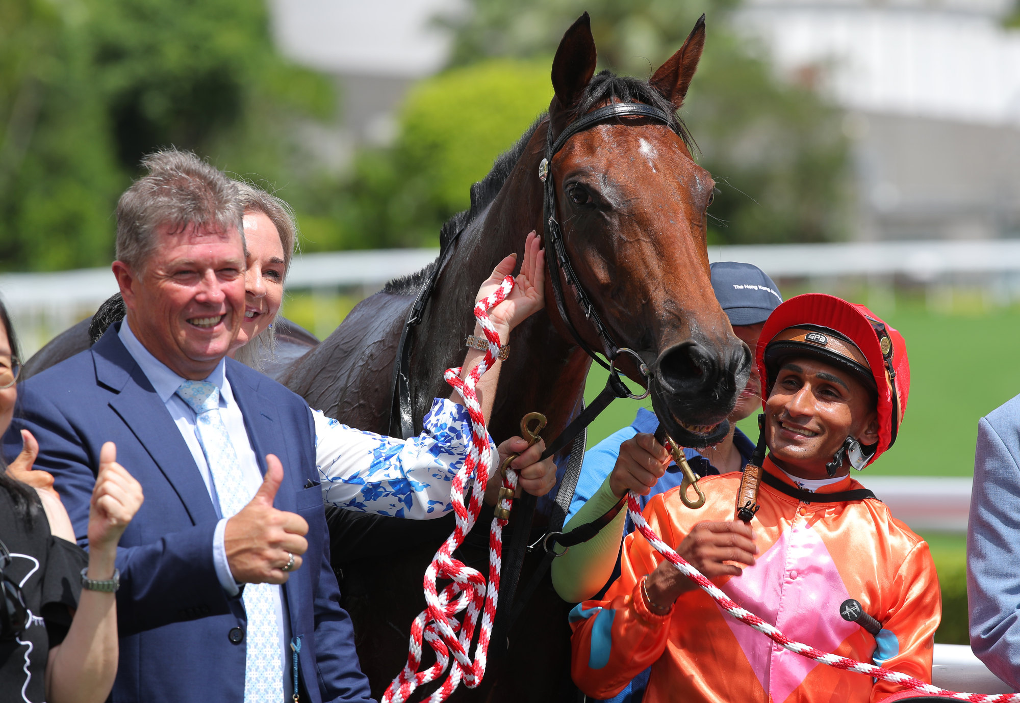 Trainer Brett Crawford and jockey Karis Teetan enjoy Speedy Smartie’s success.