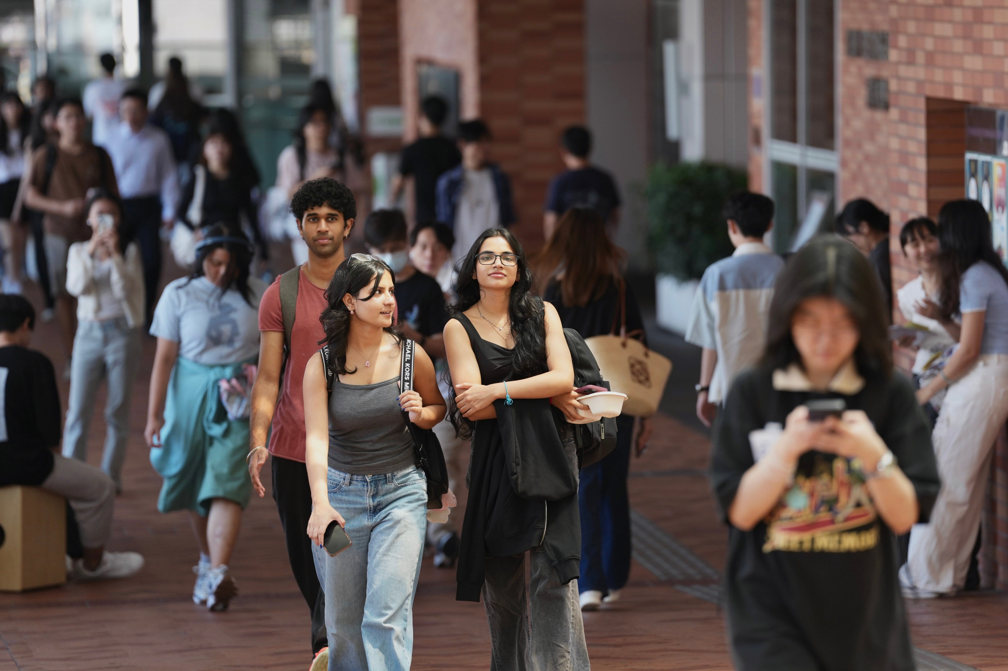 An academic has called for Hong Kong to gradually expand its non-local university student numbers amid proposals to raise the enrolment cap to 50 per cent. Photo: Karma Lo