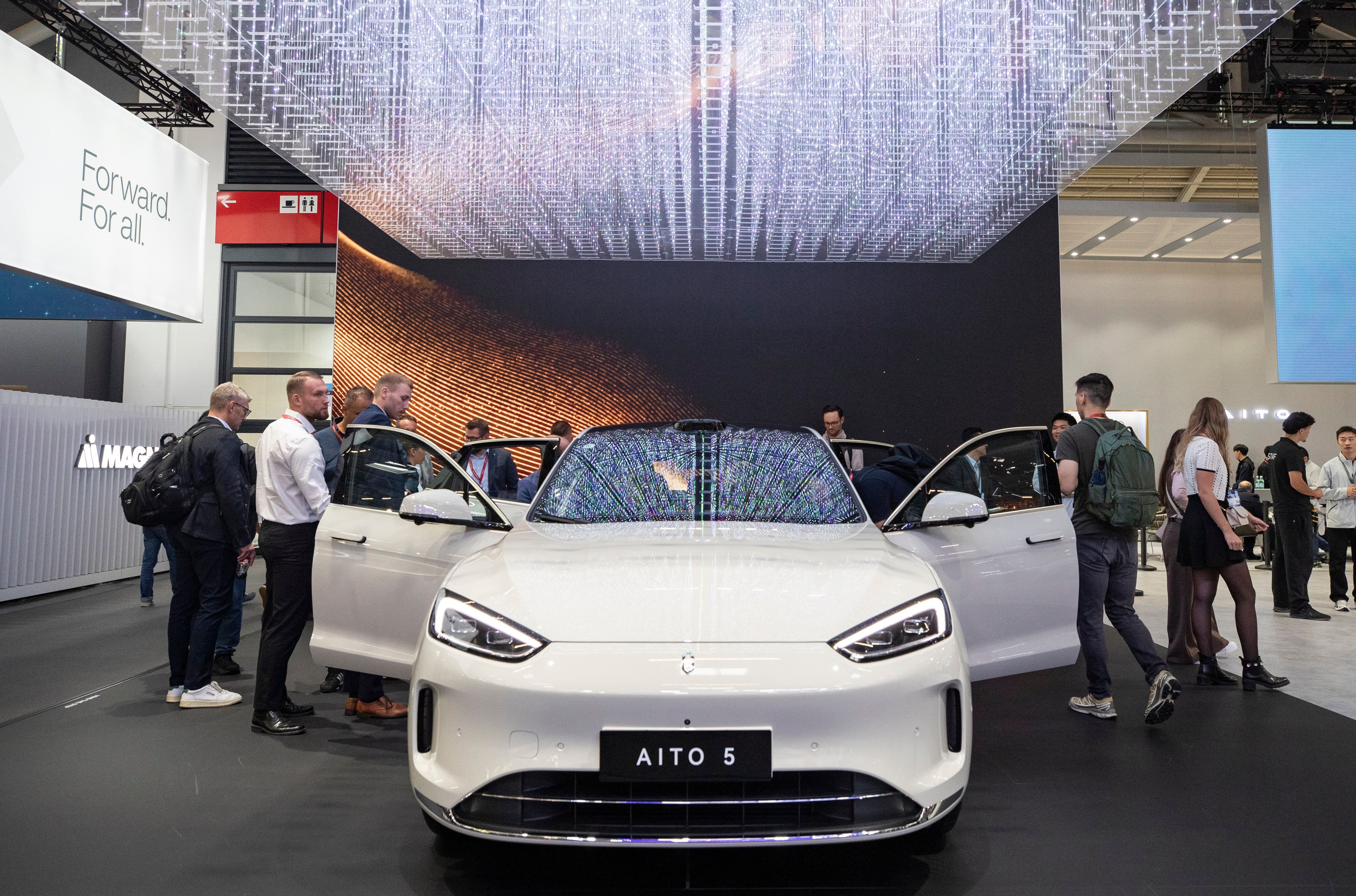 People look at an electric vehicle from Chinese brand Aito at the 2025 IAA Mobility trade fair in Munich on September 10, 2025. Photo: Xinhua