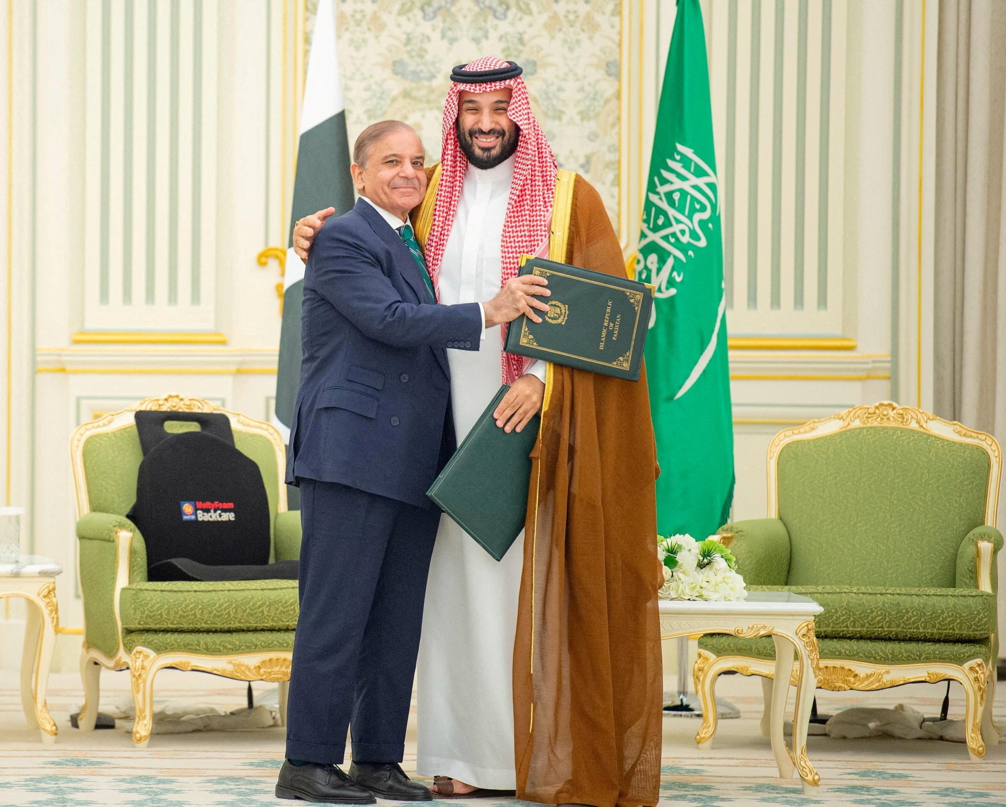 Saudi Crown Prince Mohammed bin Salman and Pakistan’s Prime Minister Shehbaz Sharif embrace after signing a defence agreement in Riyadh, Saudi Arabia, on September 17. Photo: Saudi Press Agency/Reuters