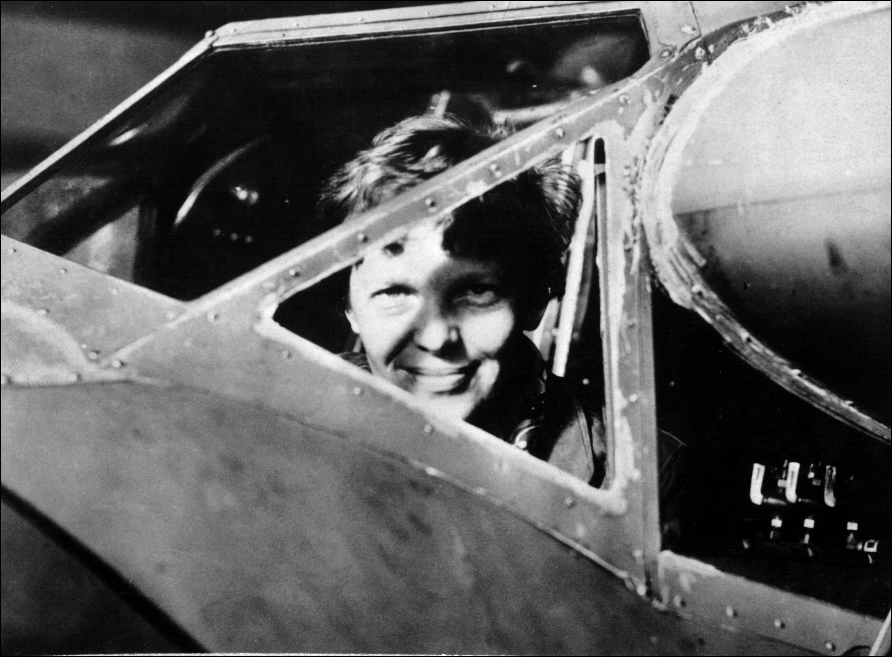 American aviator Amelia Earhart looks through the cockpit window of her plane in this undated file photograph. Photo: AFP