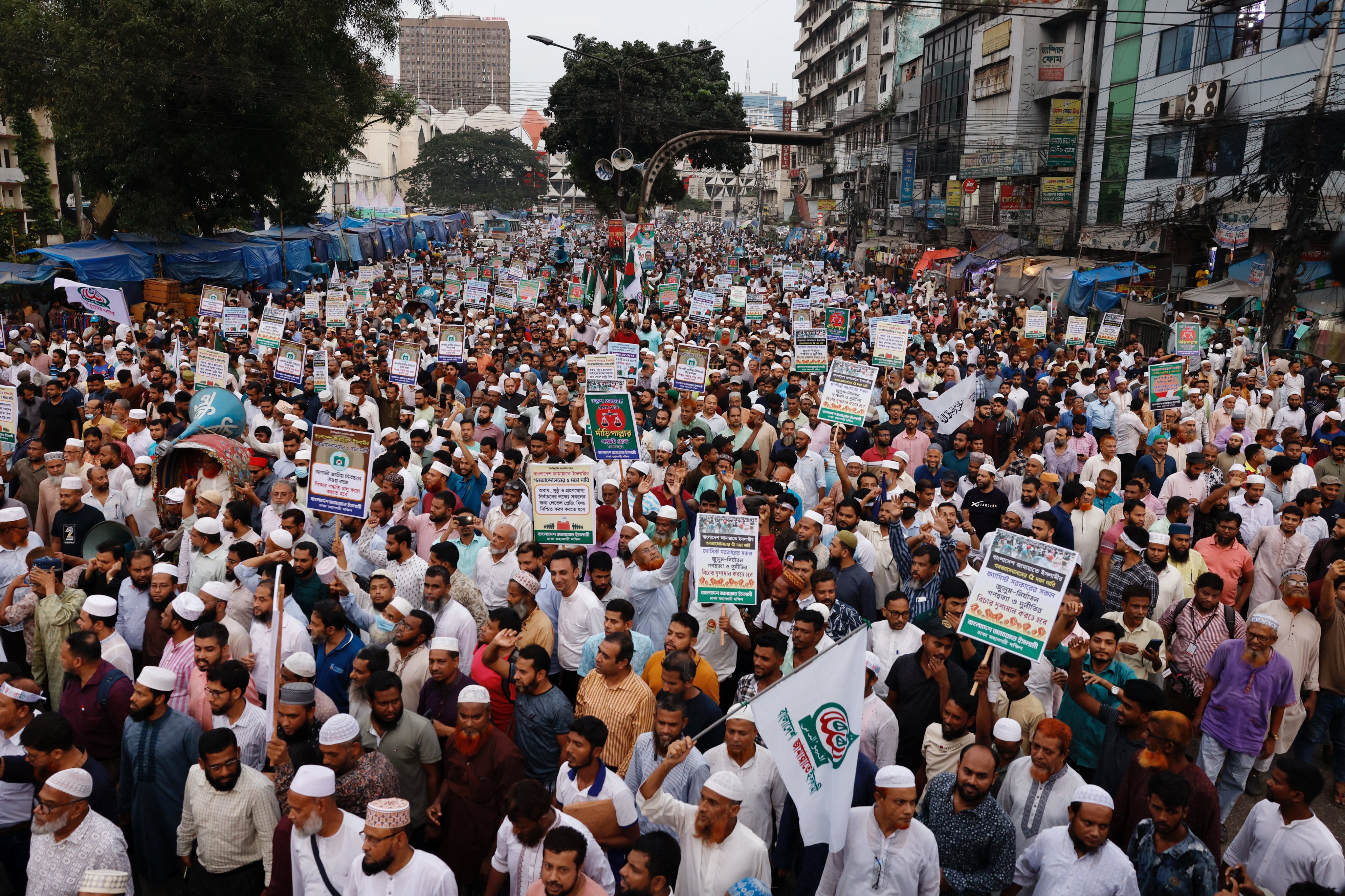 Supporters of Bangladesh’s Jamaat-e-Islami party take part in a protest rally calling for a free and fair election next year, in Dhaka on September 18. Photo: Reuters