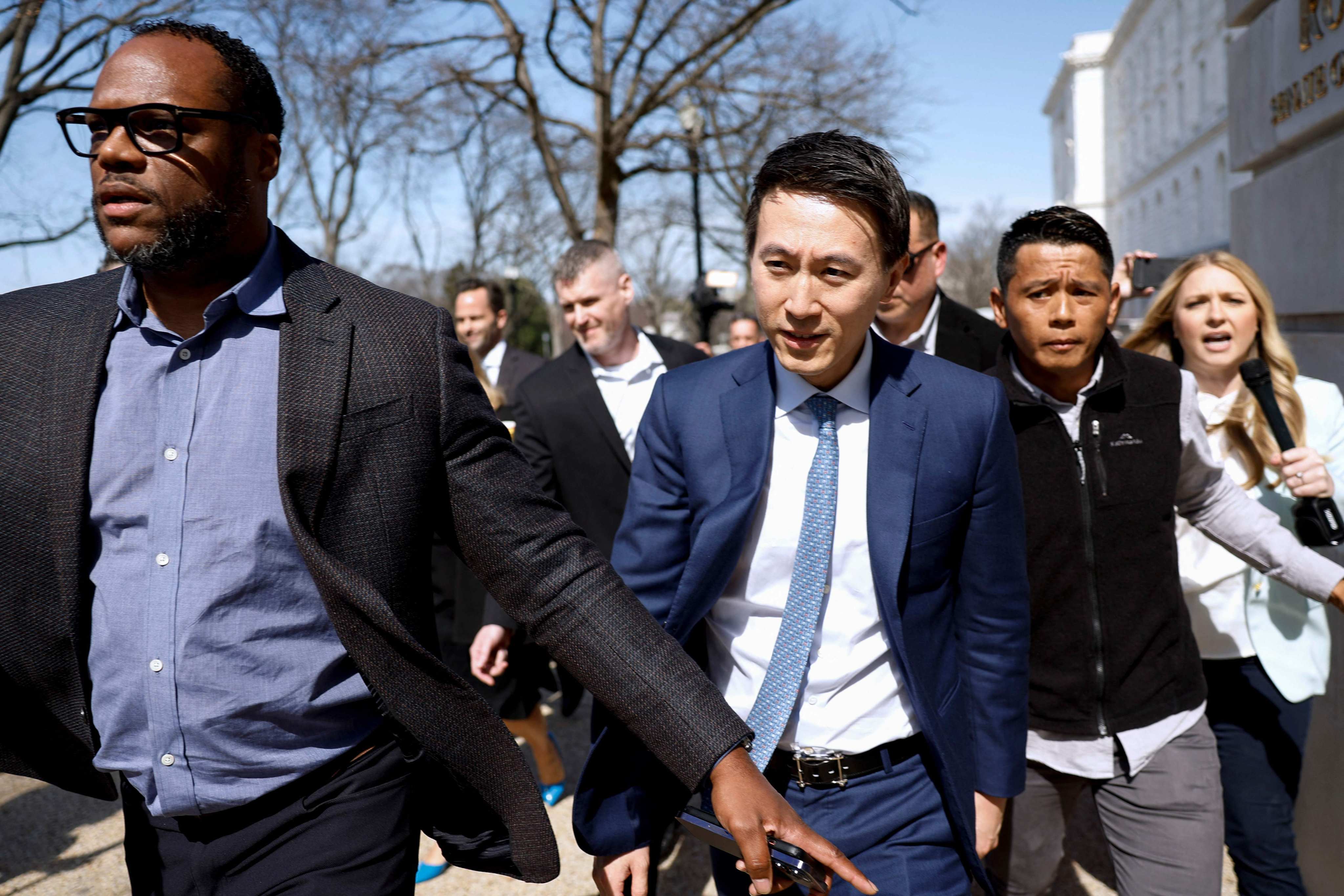 TikTok CEO Shou Zi Chew (centre) leaves the US Senate building in Washington after a meeting on March 14, 2024, amid a push by the US to ban operations relating to TikTok. Photo: Getty Images via AFP