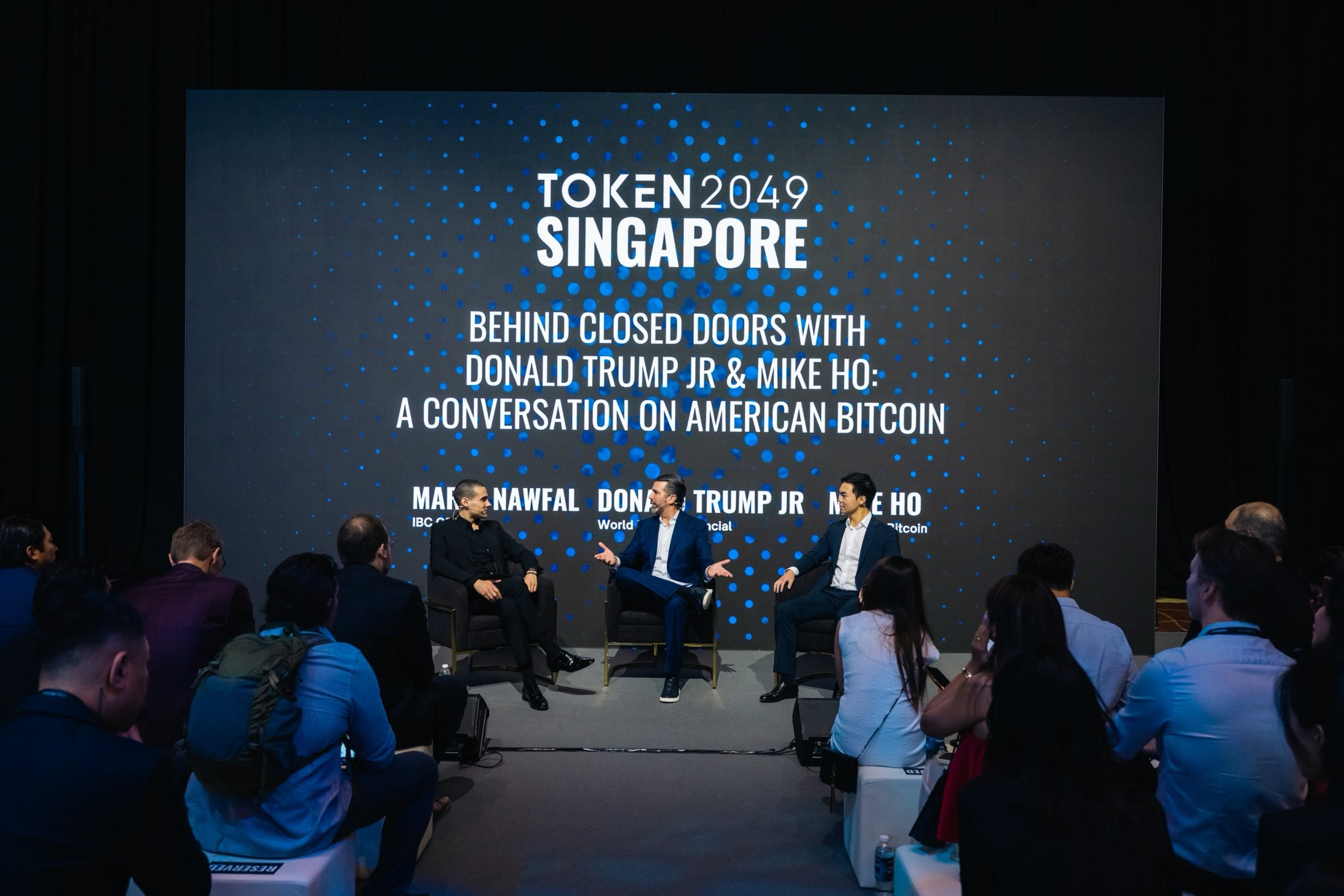 World Liberty Financial co-founder Donald Trump Jnr takes centre stage at the Token2049 event in Singapore on Wednesday. He is flanked by entrepreneur Mario Nawfal, left, and US Bitcoin Corp CEO Mike Ho. Photo: Token2049