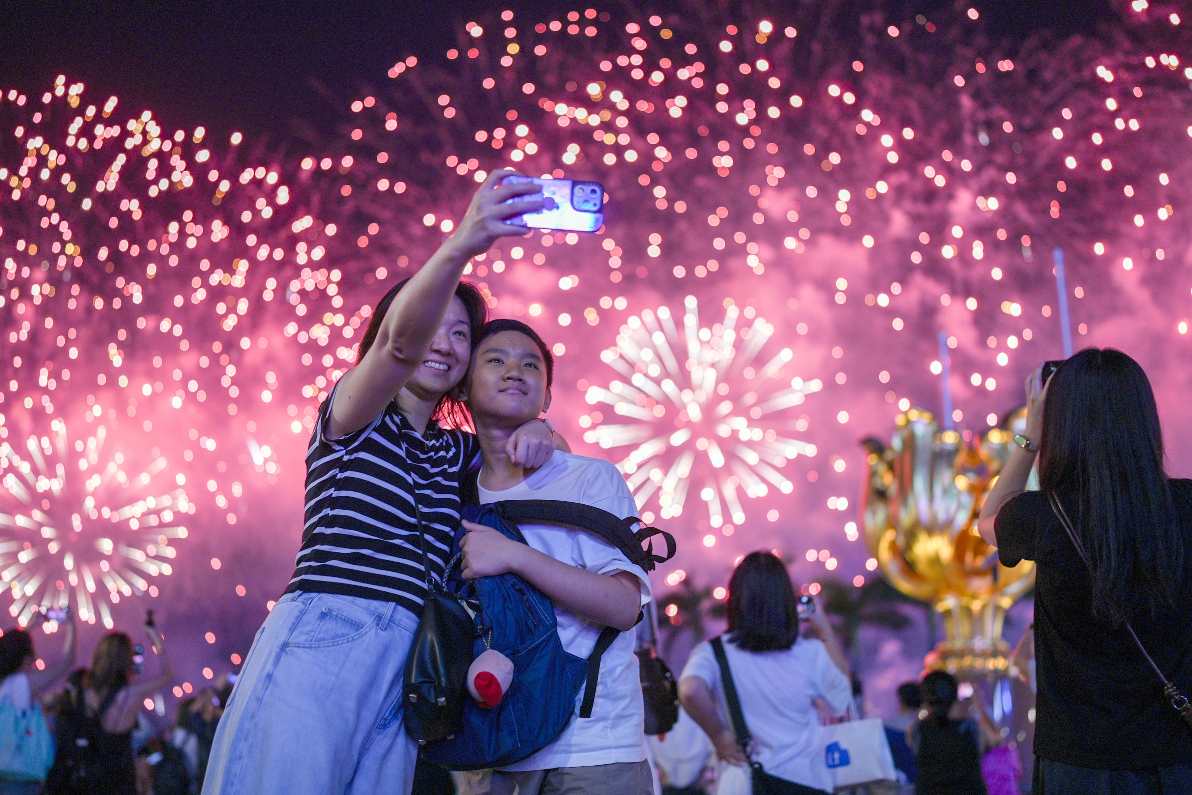 Hong Kong’s National Day fireworks display makes a great backdrop for a selfie. Photo: Eugene Lee