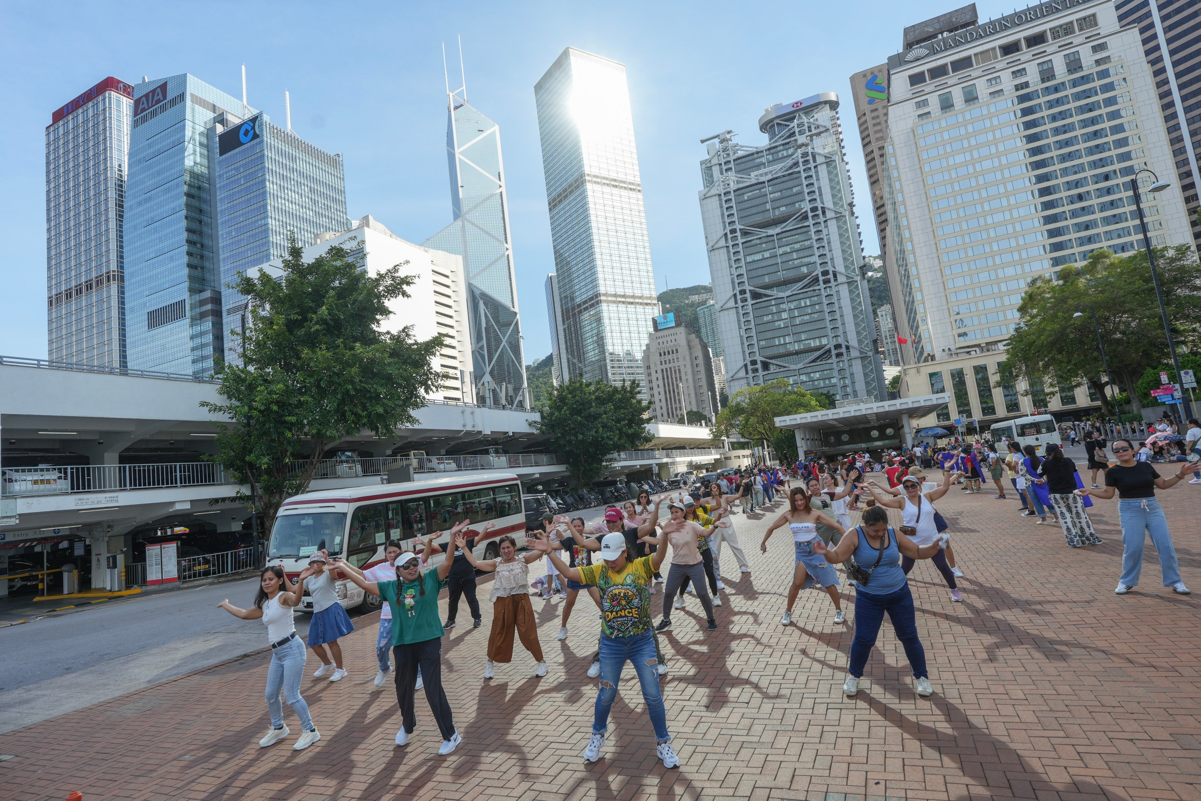 A group of domestic helpers dance in Central on July 27. Photo: Sun Yeung