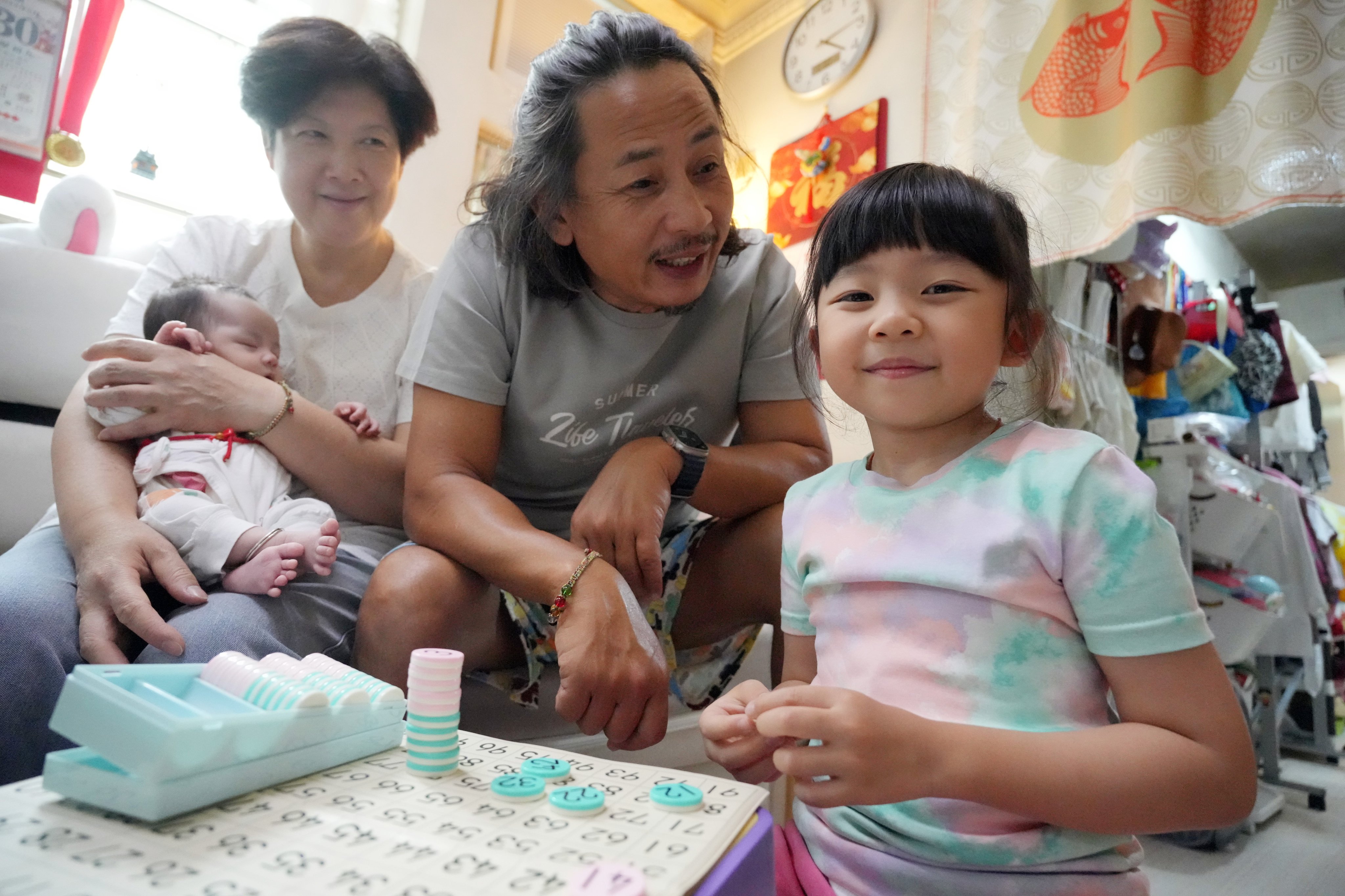 Baby Gia is the latest addition to the family.      Photo: May Tse