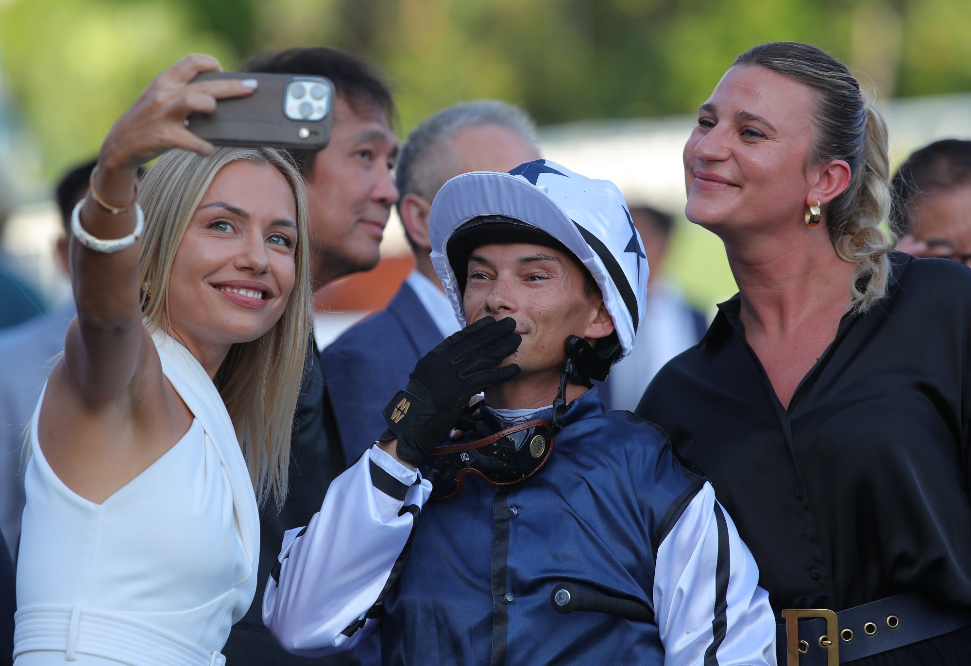 Jockey Alexis Badel celebrates with wife Eva Crone (left).
