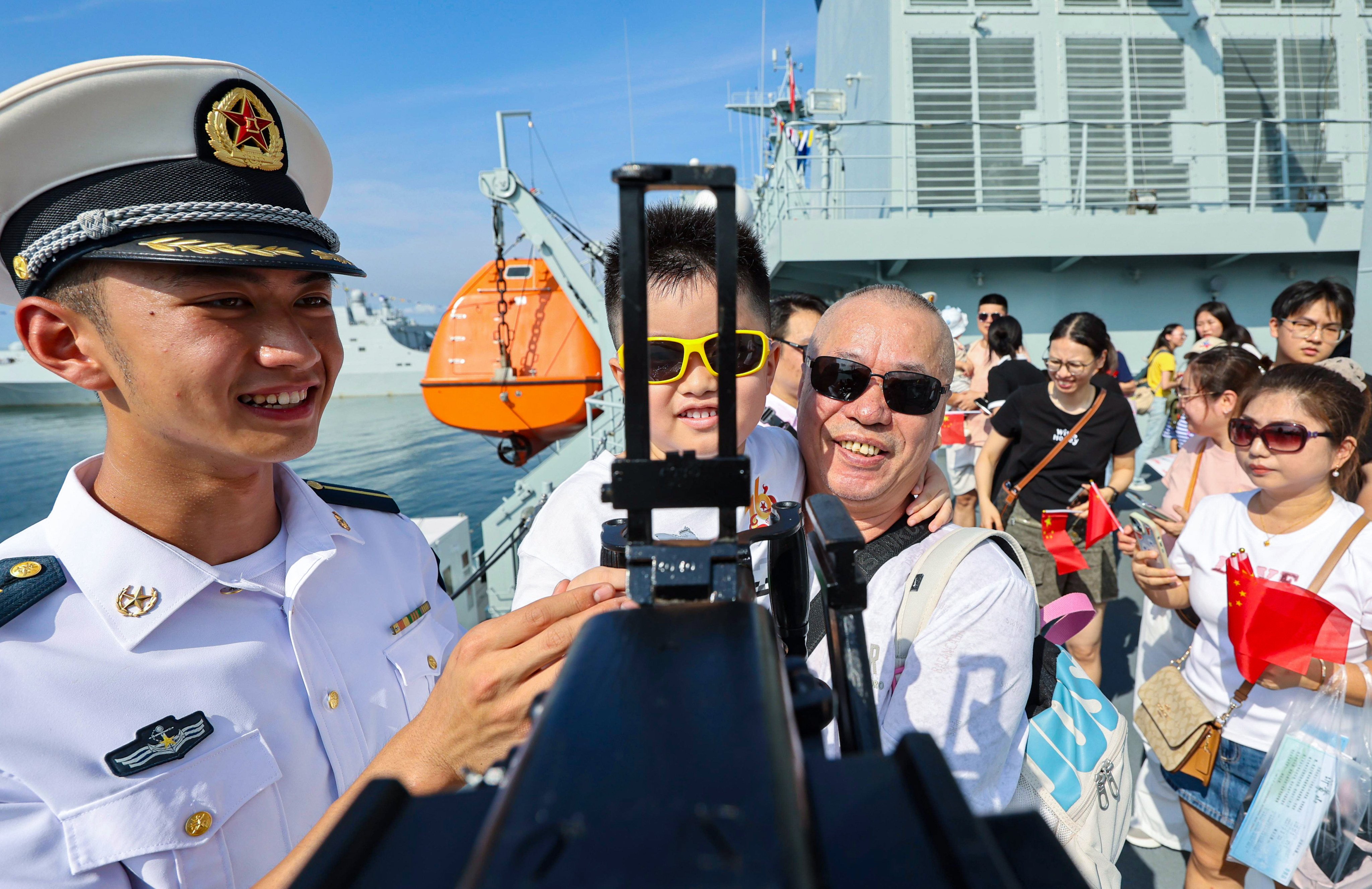 Visitors tour the Qi Jiguang at Stonecutters Island on Wednesday. Photo:  Karma Lo