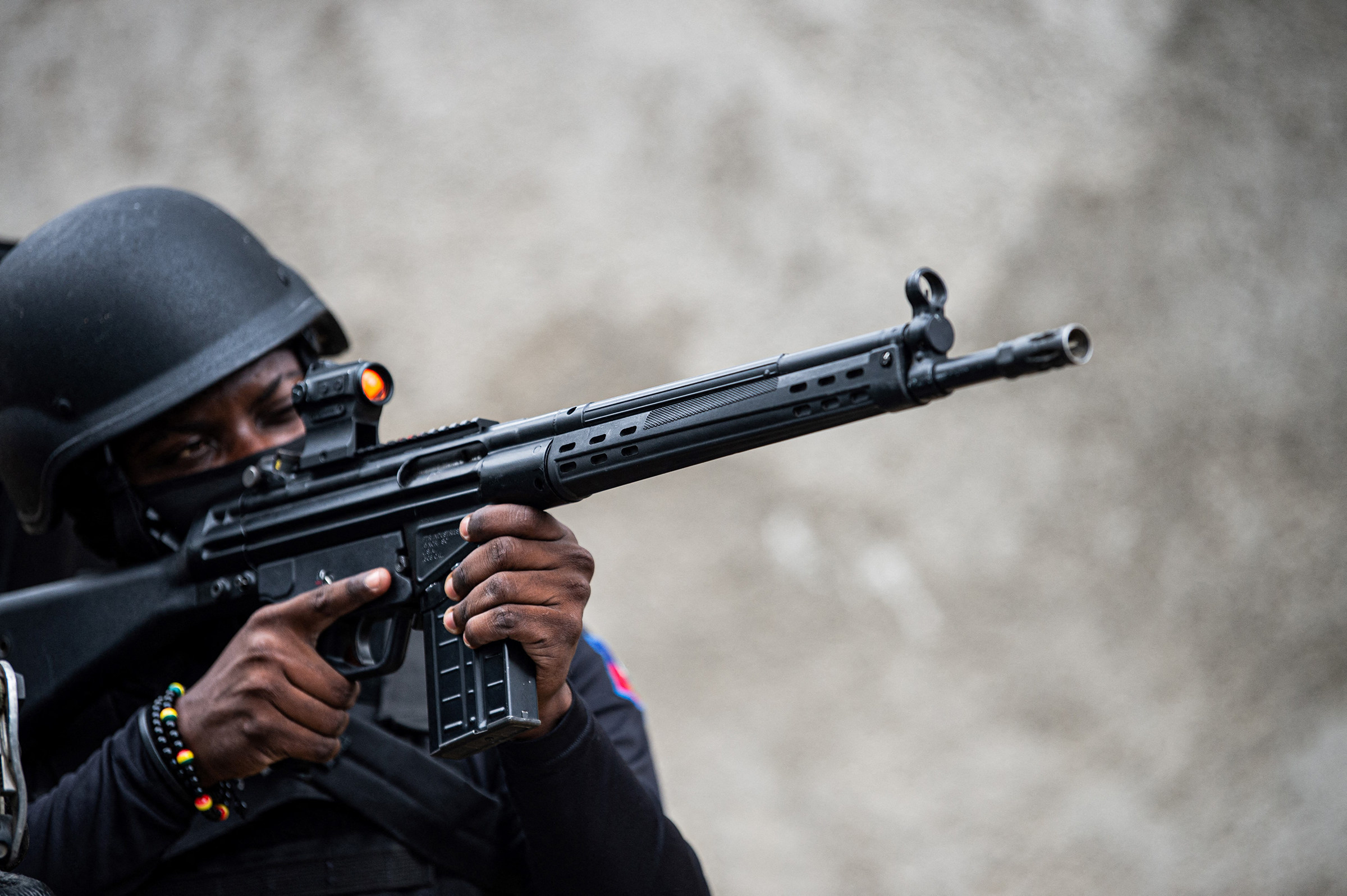 A Haitian police officer patrols in Kenscoff, a suburb of Port-au-Prince. Photo: AFP