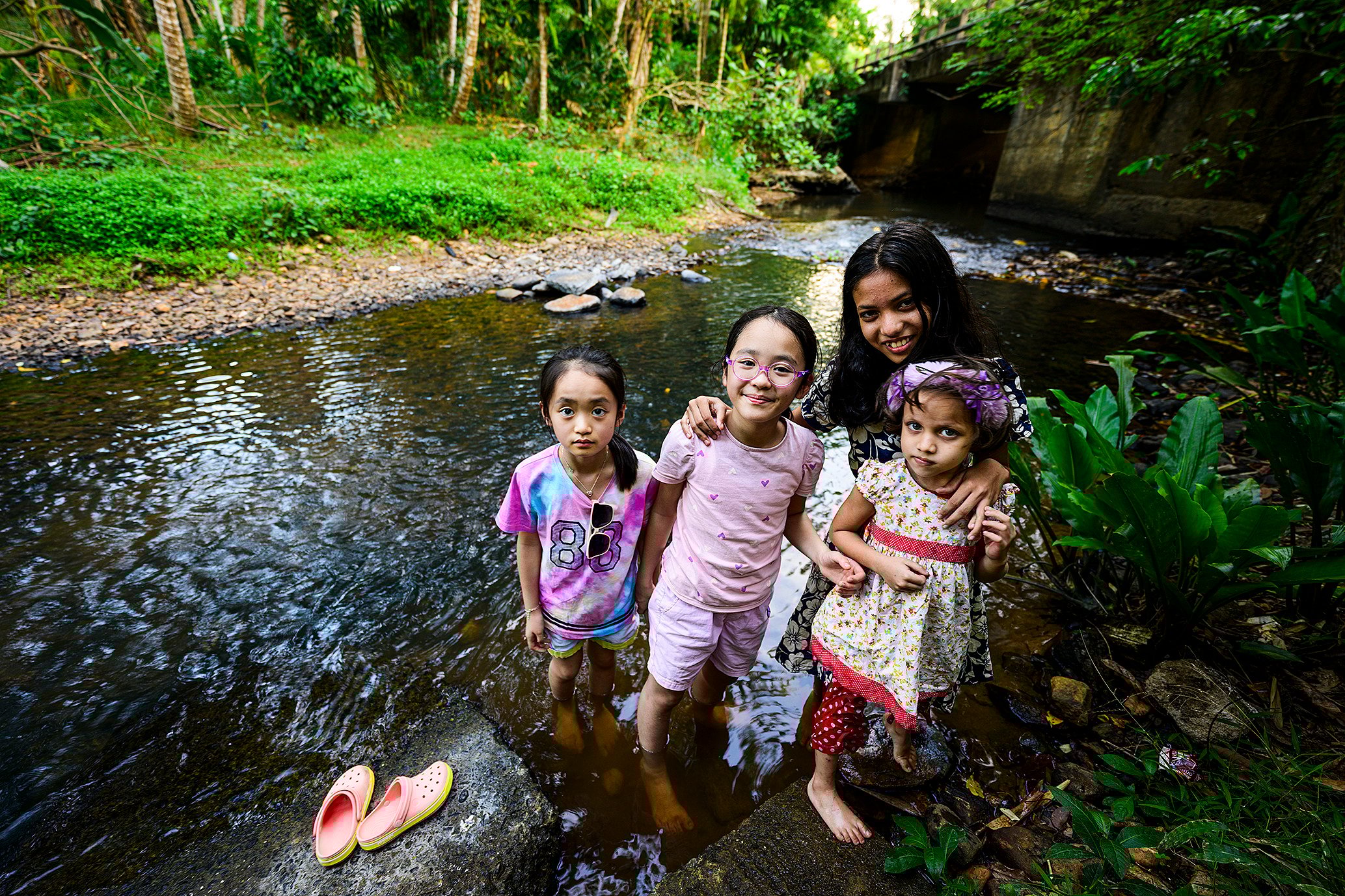 (From left) Hong Kong psychiatrist Dr Ivan Mak’s two daughters pose with their new Sri Lankan friends on a family trip to the country. Mak says he and his family learned valuable lessons about mental well-being and making connections on the trip. Photo: courtesy of Ivan Mak