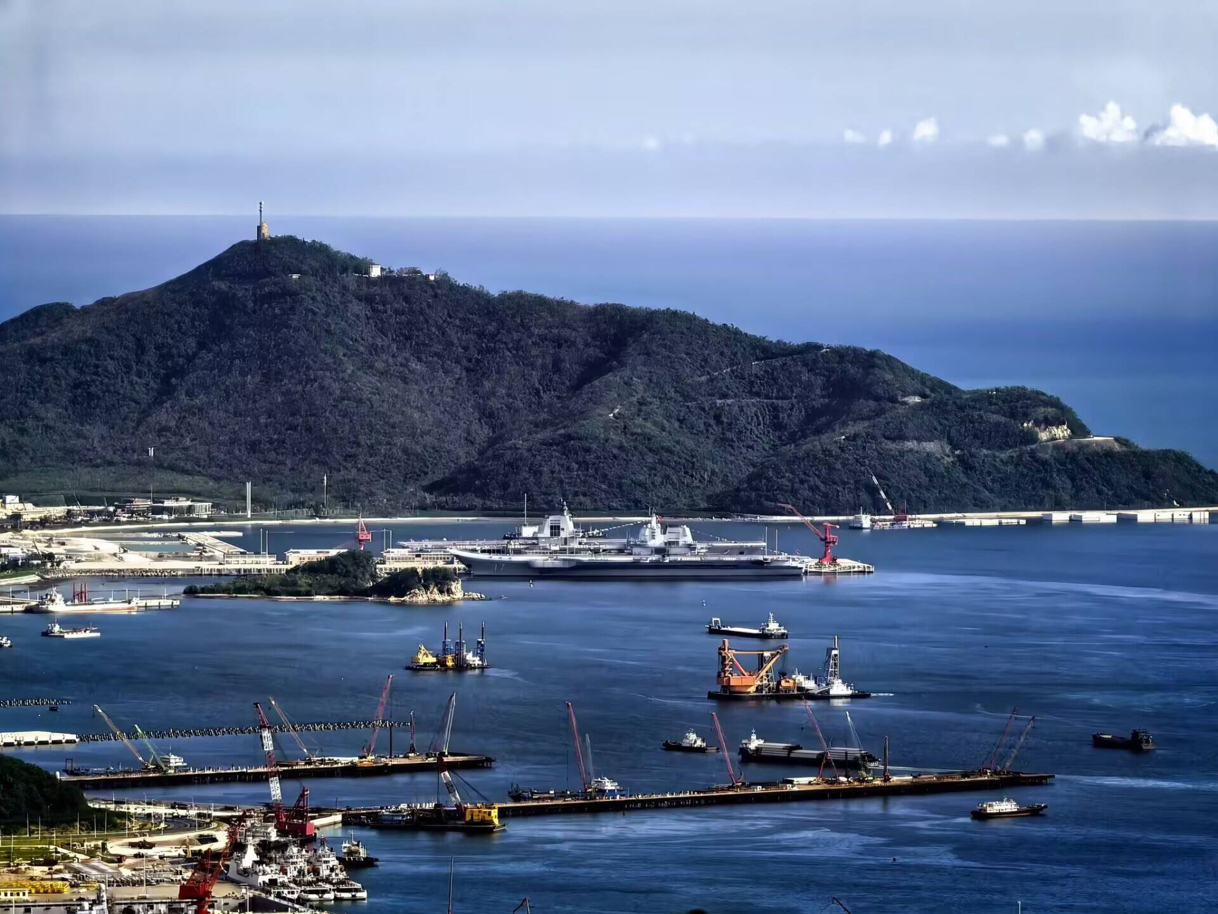 The Shandong in the foreground is berthed next to the Fujian at a base in Sanya, Hainan province. Photo: X/ RupprechtDeino