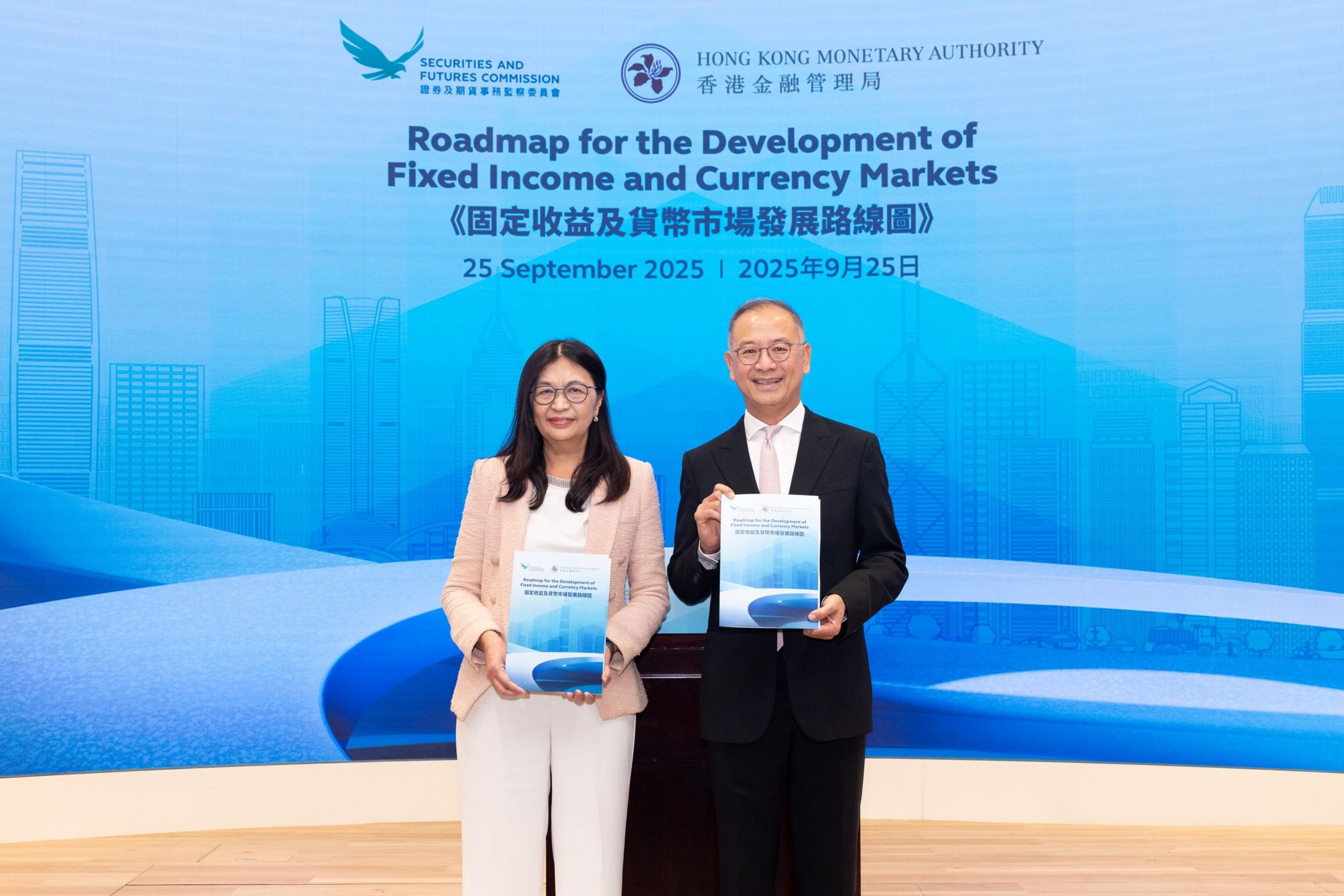 Securities and Futures Commission CEO Julia Leung Fung-yee (left) with Hong Kong Monetary Authority Chief Executive Eddie Yuen Wai-man at the launch of the road map on September 25. Photo: Handout