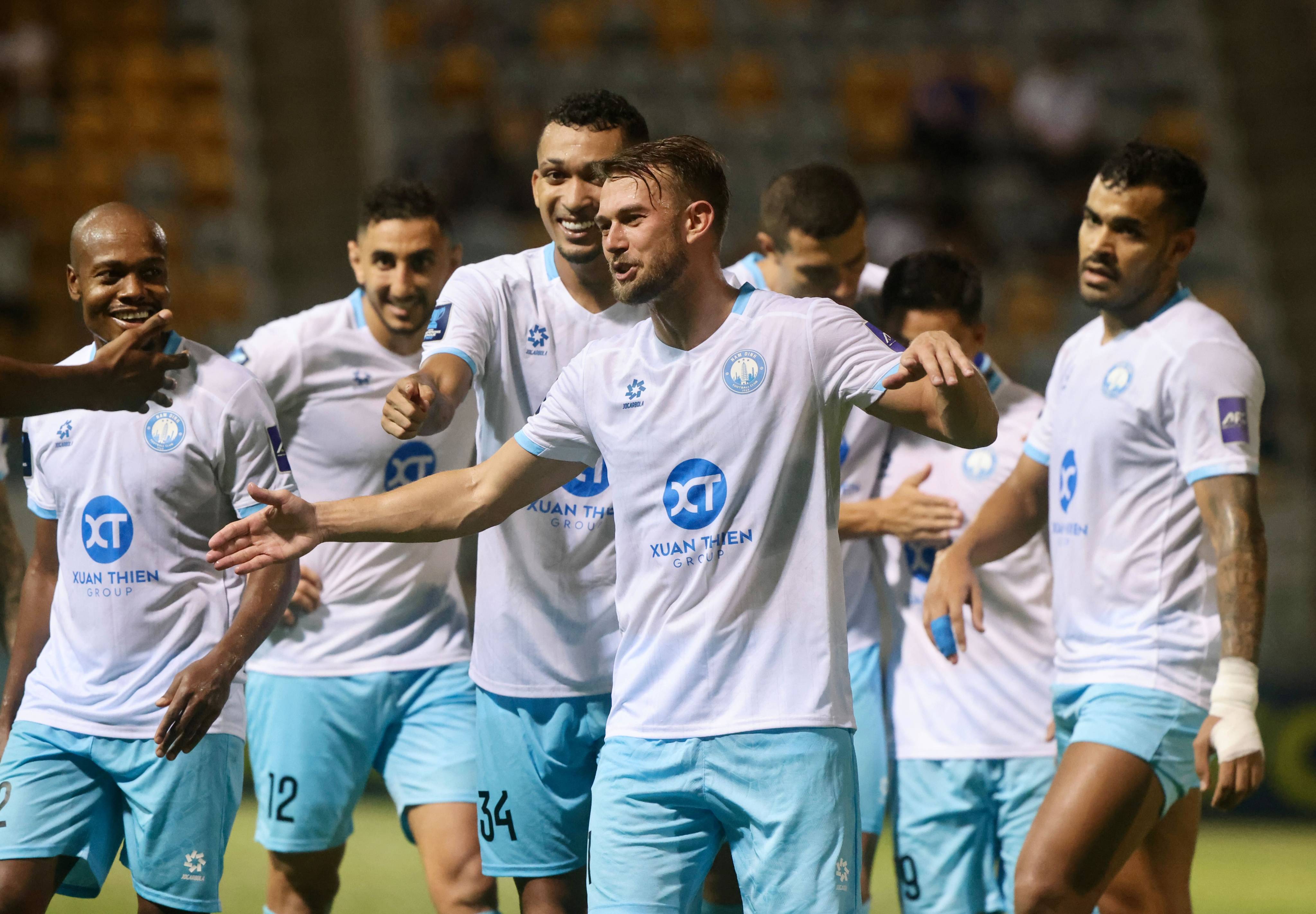 Kristoffer Hansen leads the celebrations after scoring Nam Dinh’s decisive goal against Eastern. Photo: Jonathan Wong