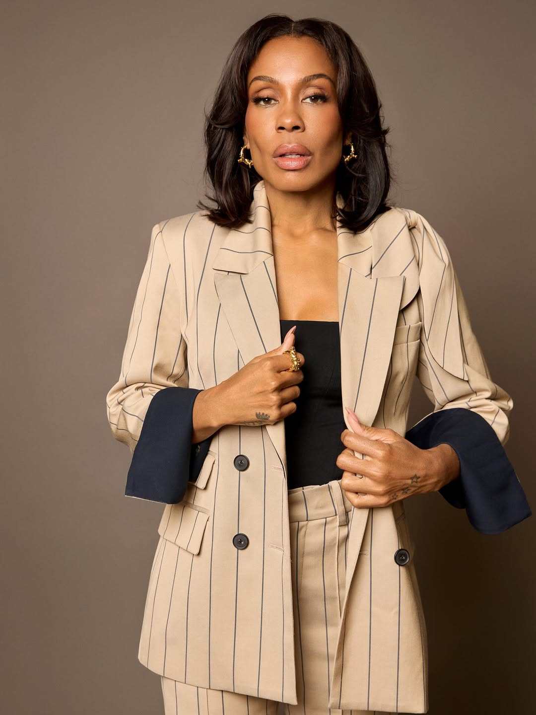 Emmy-nominated actress Karen Pittman is making waves for her role as Mia Jordan in The Morning Show. Photo: @thekarenpittman/Instagram