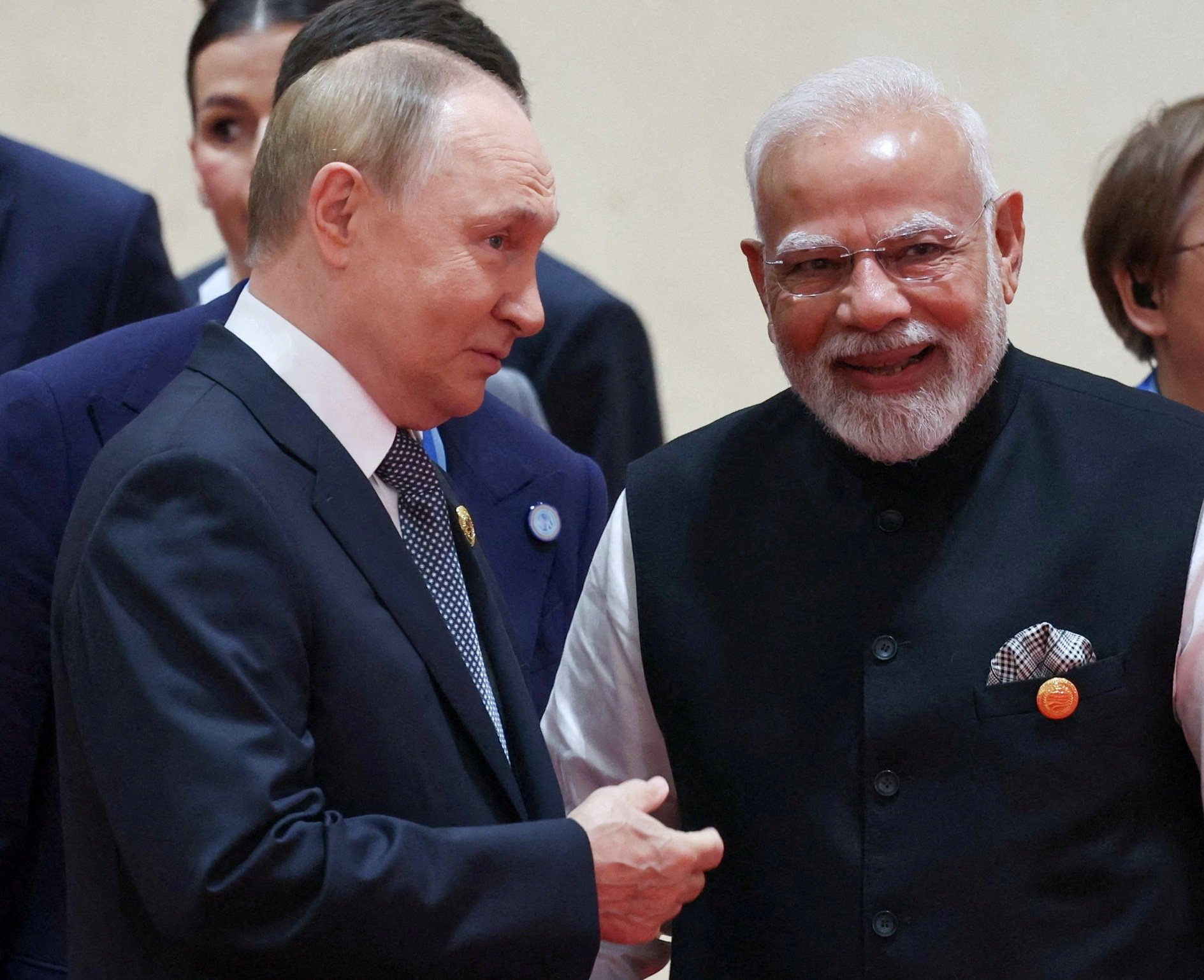 Russian President Vladimir Putin and Indian Prime Minister Narendra Modi speak during a meeting at the Shanghai Cooperation Organisation summit in Tianjin, China, on September 1. Photo: Pool via Reuters
