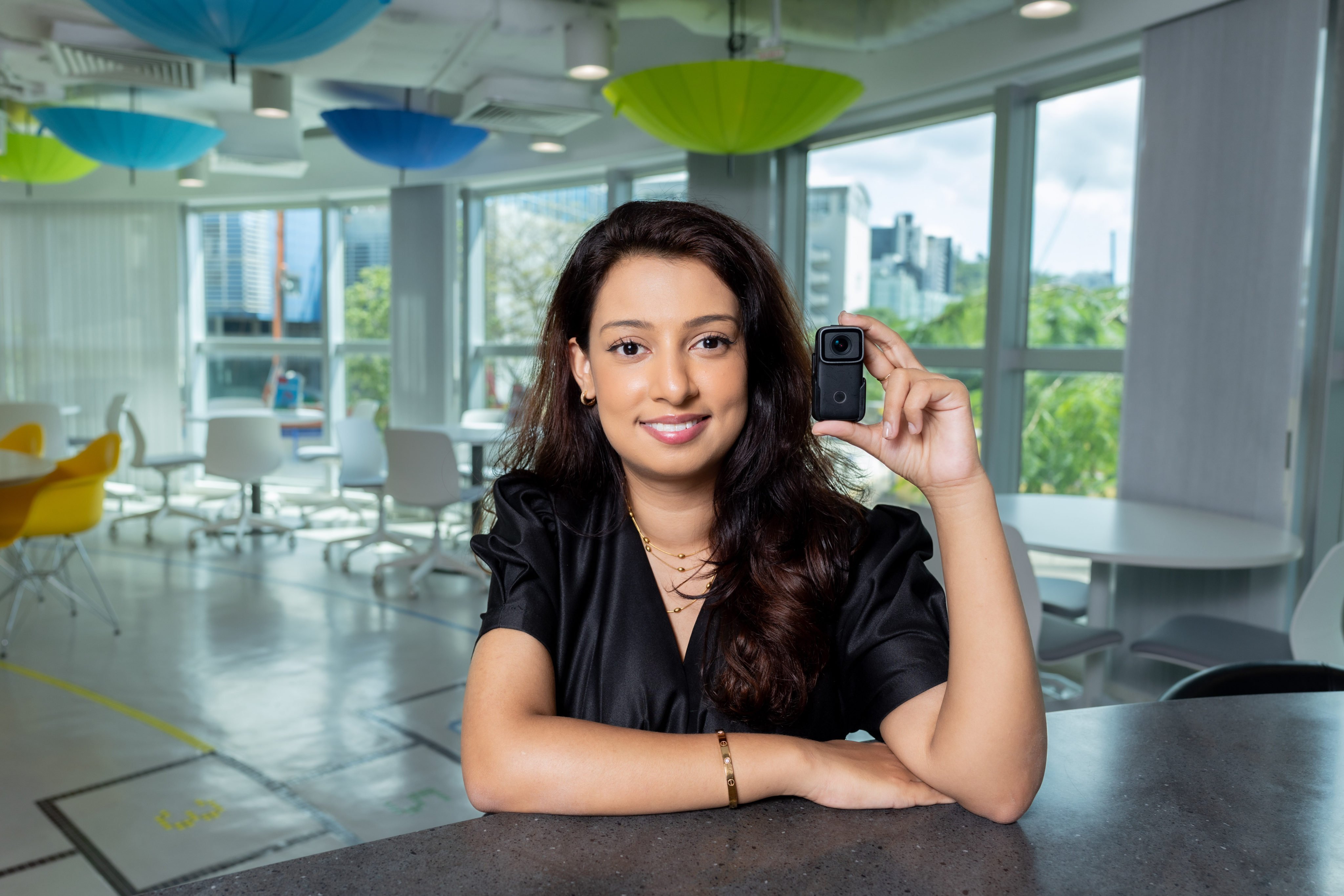 Hong Kong innovator Lamia Sreya Rahman showcases her start-up’s AI-powered body cam. Photo: Kong Yat-pang