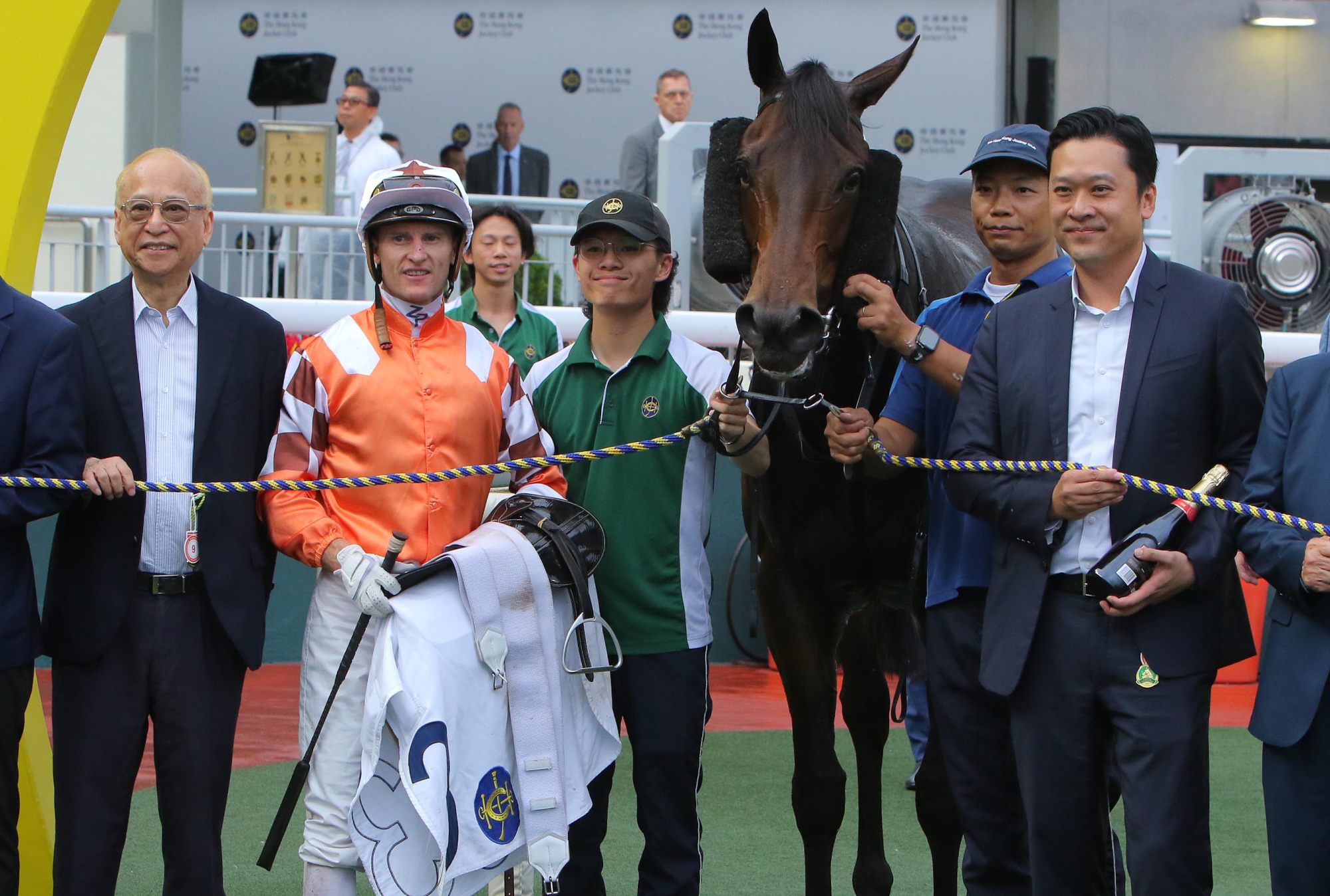 Jockey Zac Purton celebrates Bulb General’s latest win with connections. Jockey Zac Purton celebrates Bulb General’s latest win with connections.