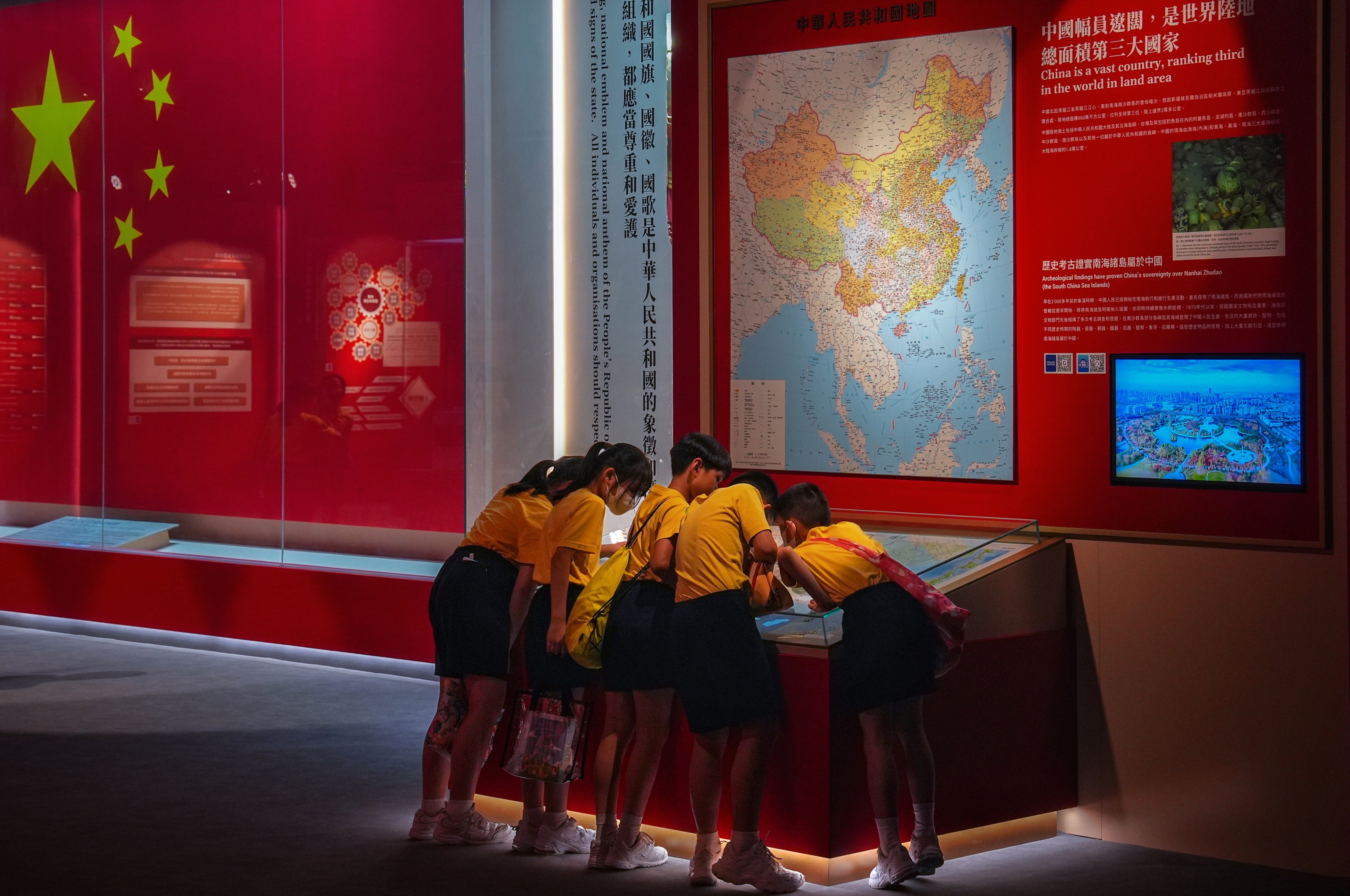 Students take a look at a map of China in a gallery of the Hong Kong Museum of History. Photo: Elson Li