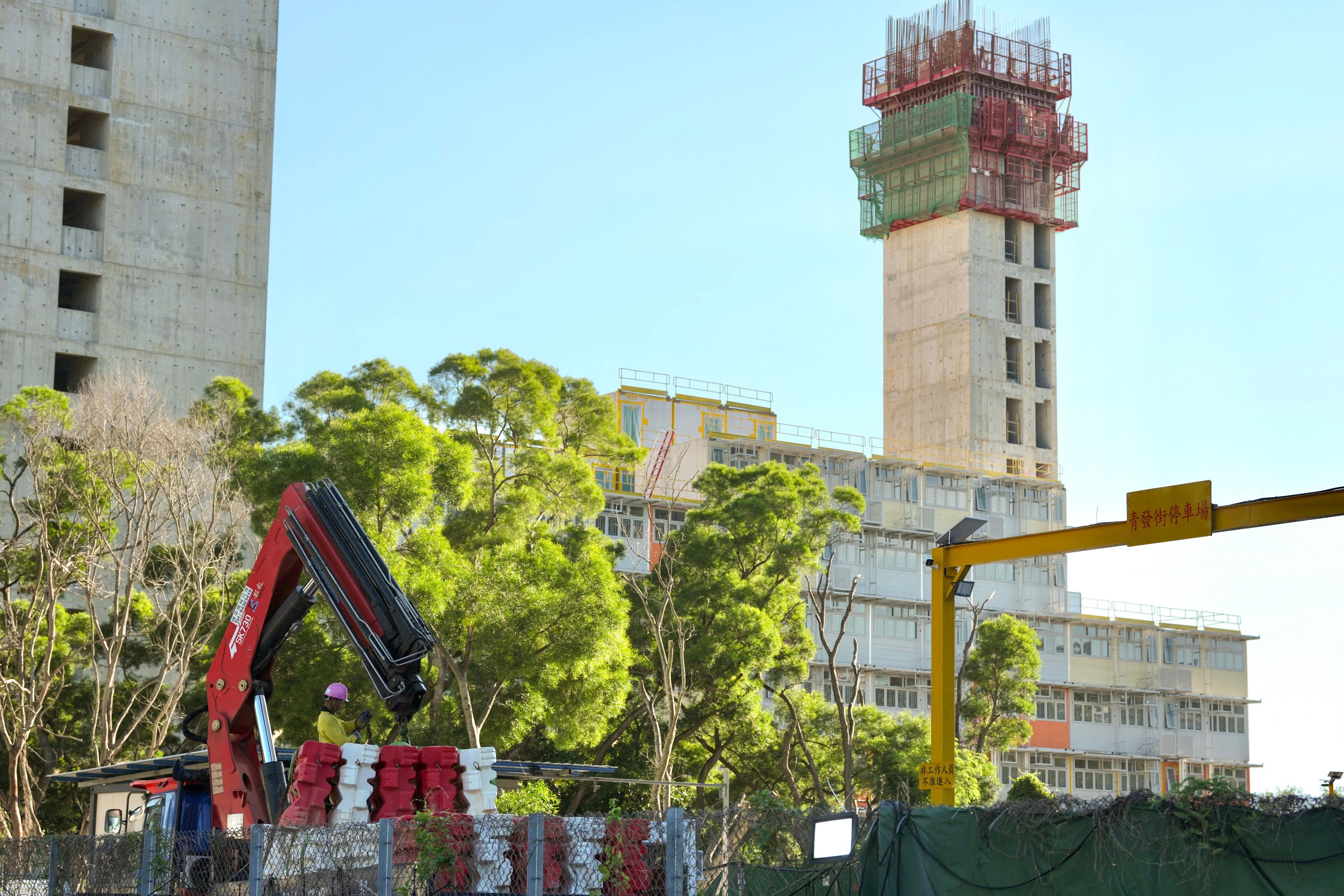 The department has stepped up inspections at the Siu Lam site and the two other light public housing projects in Tuen Mun and Chai Wan. Photo: Karma Lo