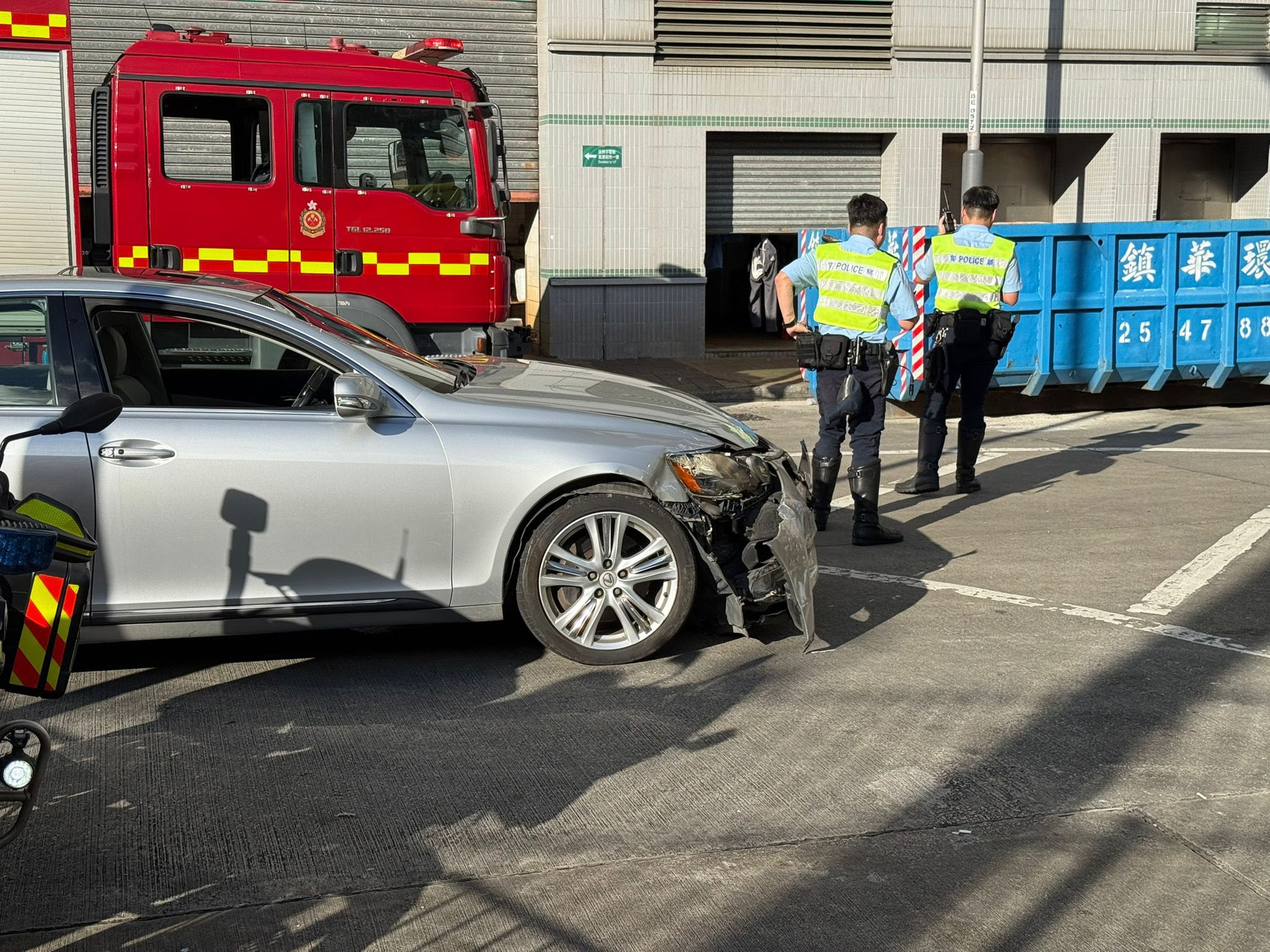 A pedestrian was killed and three others were injured after a private car collided with a van. Photo: SCMP
