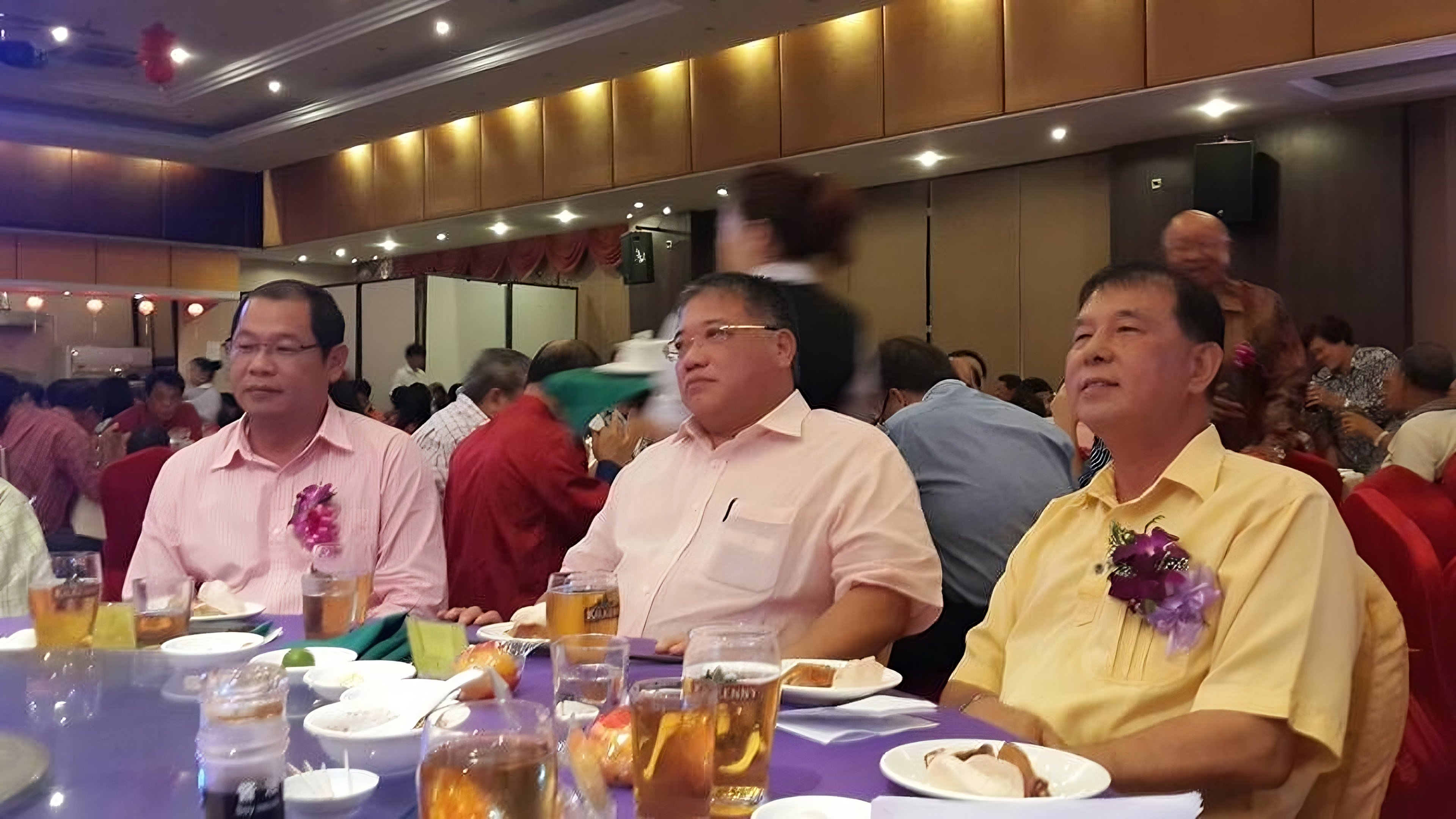 Malaysian MP Tiong King Sing (centre) pictured at an event with alcohol in 2016. Photo: Facebook/Adam.Yii
