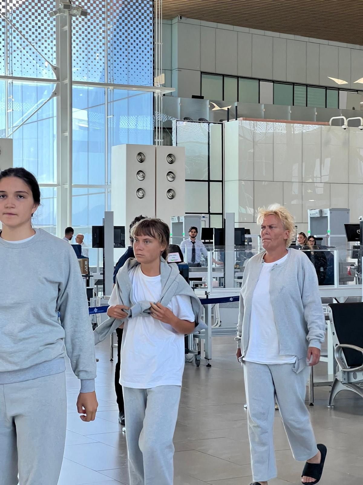 Swedish activist Greta Thunberg, centre, before her deportation at an Israeli airport. Photo: Israel Foreign Ministry / Reuters