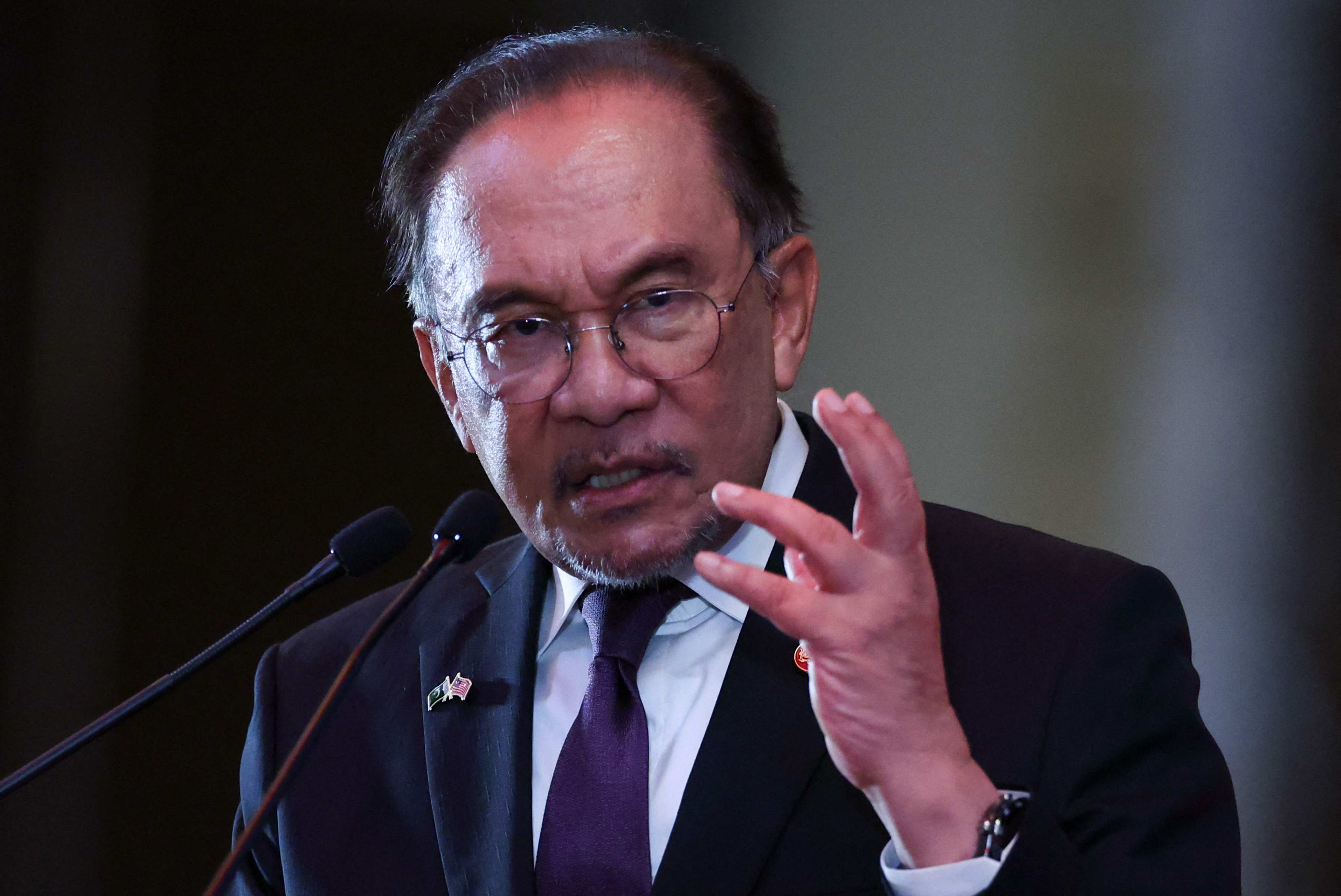 Malaysia’s Prime Minister Anwar Ibrahim speaks at a conference in Kuala Lumpur on Monday. Photo: AFP