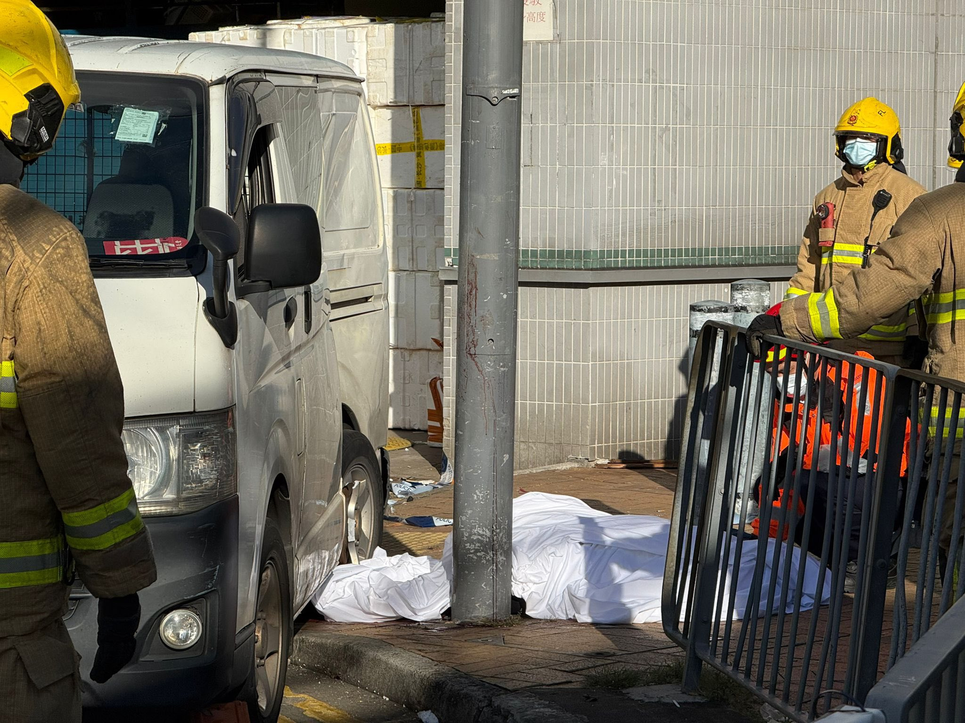 A car hit a stationary van, prompting the second vehicle to mount the pavement and strike the two women. Photo: Handout