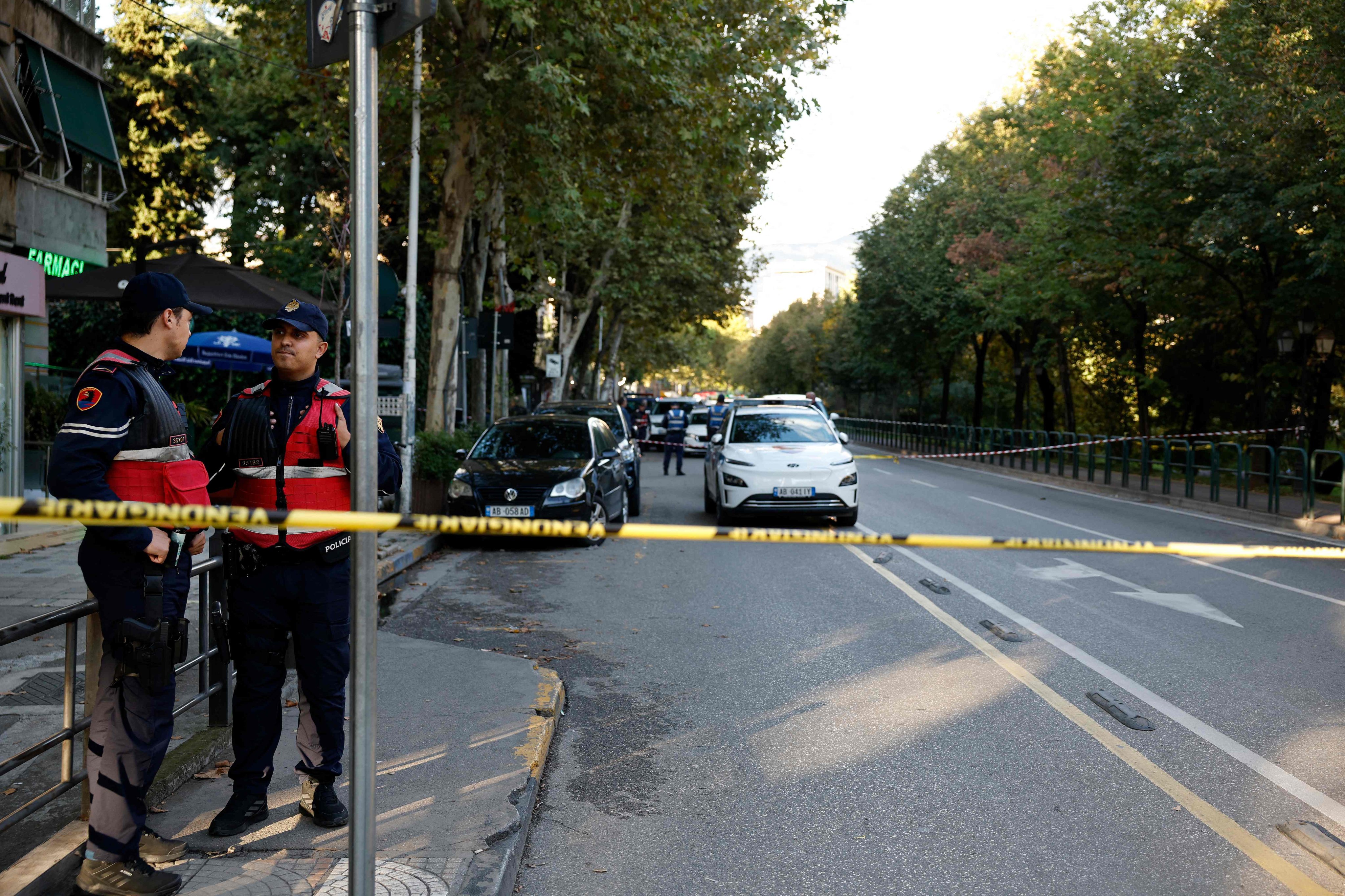 Police secure the perimeter outside the court where a judge was shot dead in Tirana, Albania on Monday. Photo: AFP