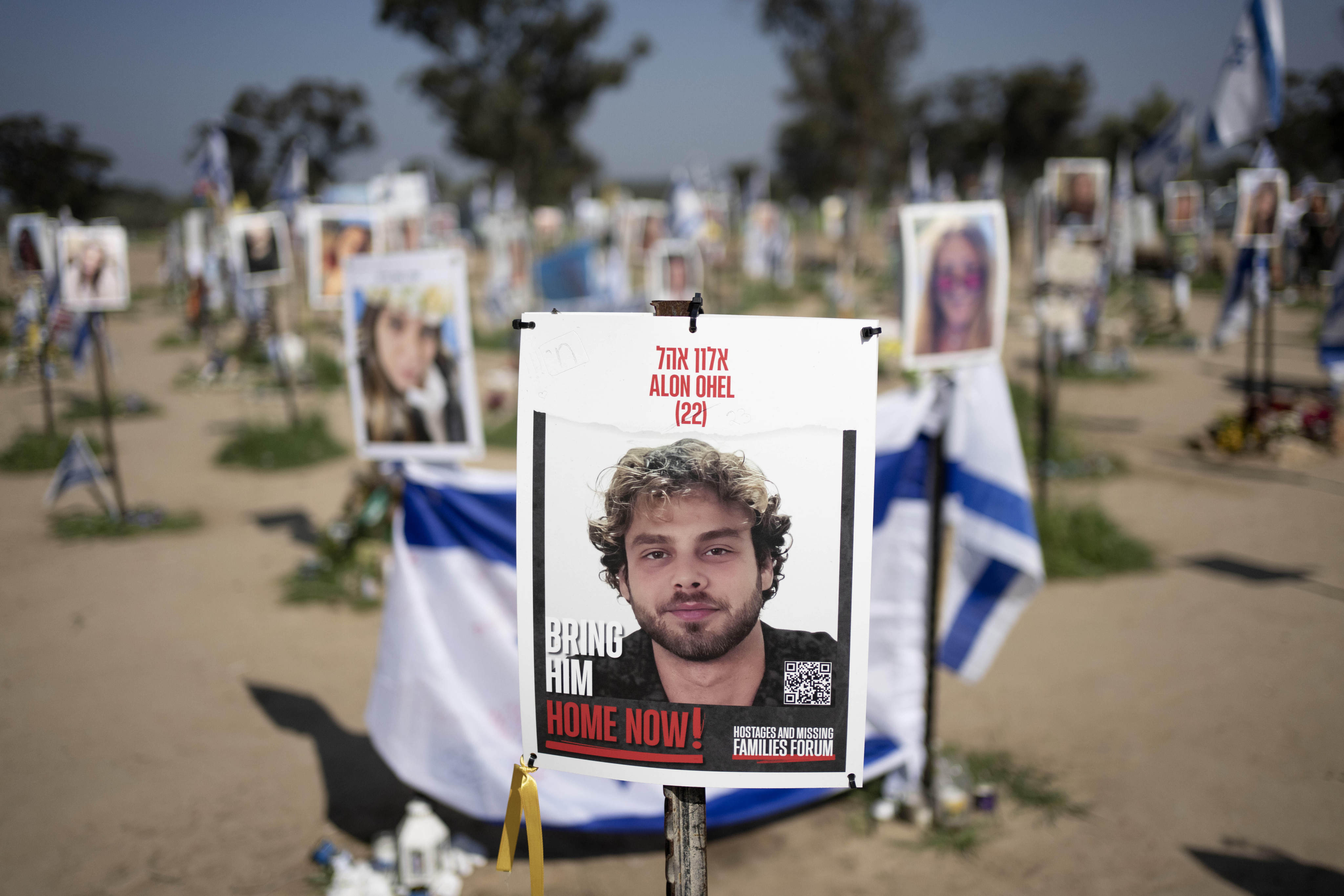 A poster depicting Israeli hostage Alon Ohel is displayed in Re’im, southern Israel, at the Gaza border, in February 2024. Photo: AFP