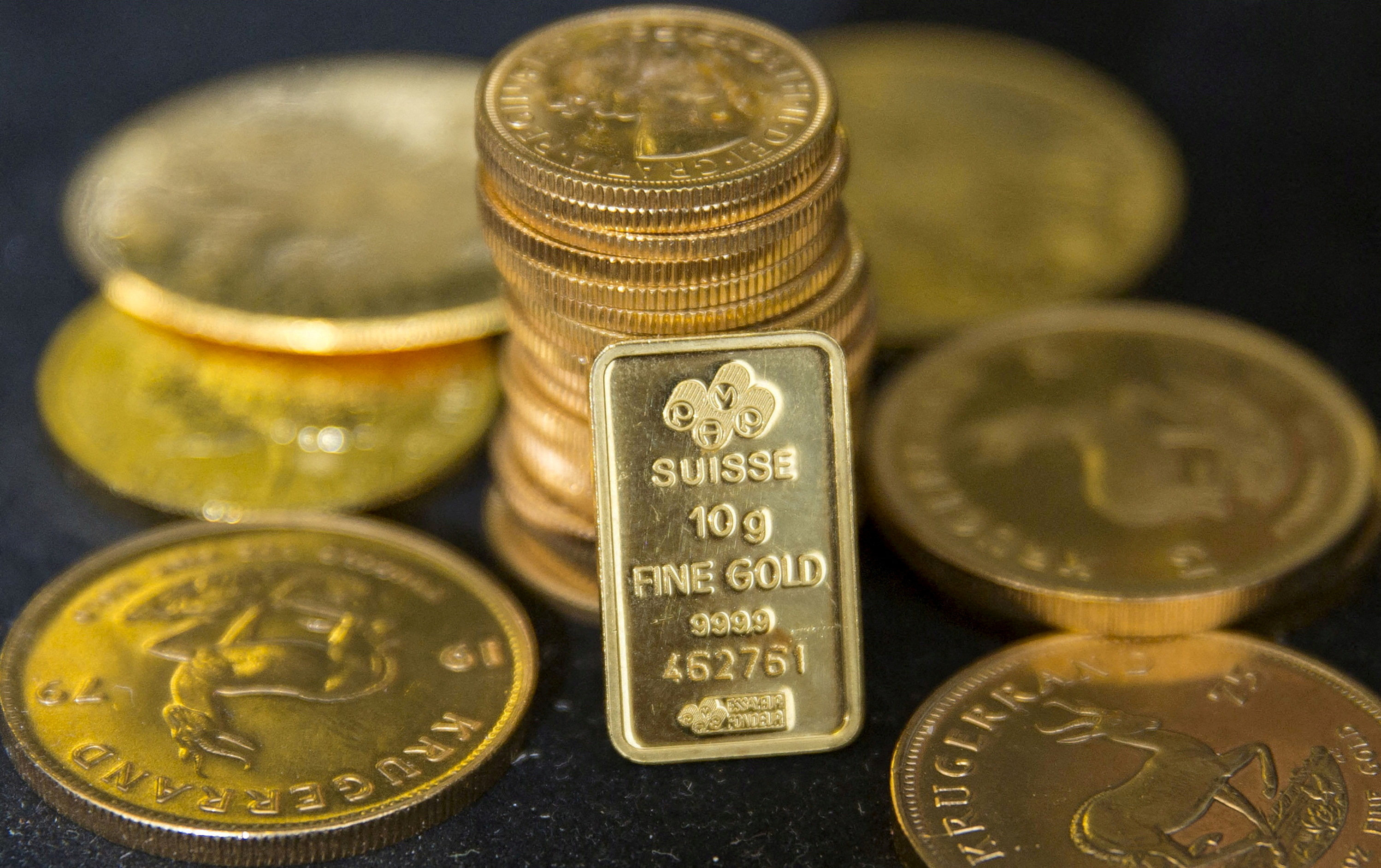 Gold bullion is displayed at precious metal dealer in London in 2015. Photo: Reuters