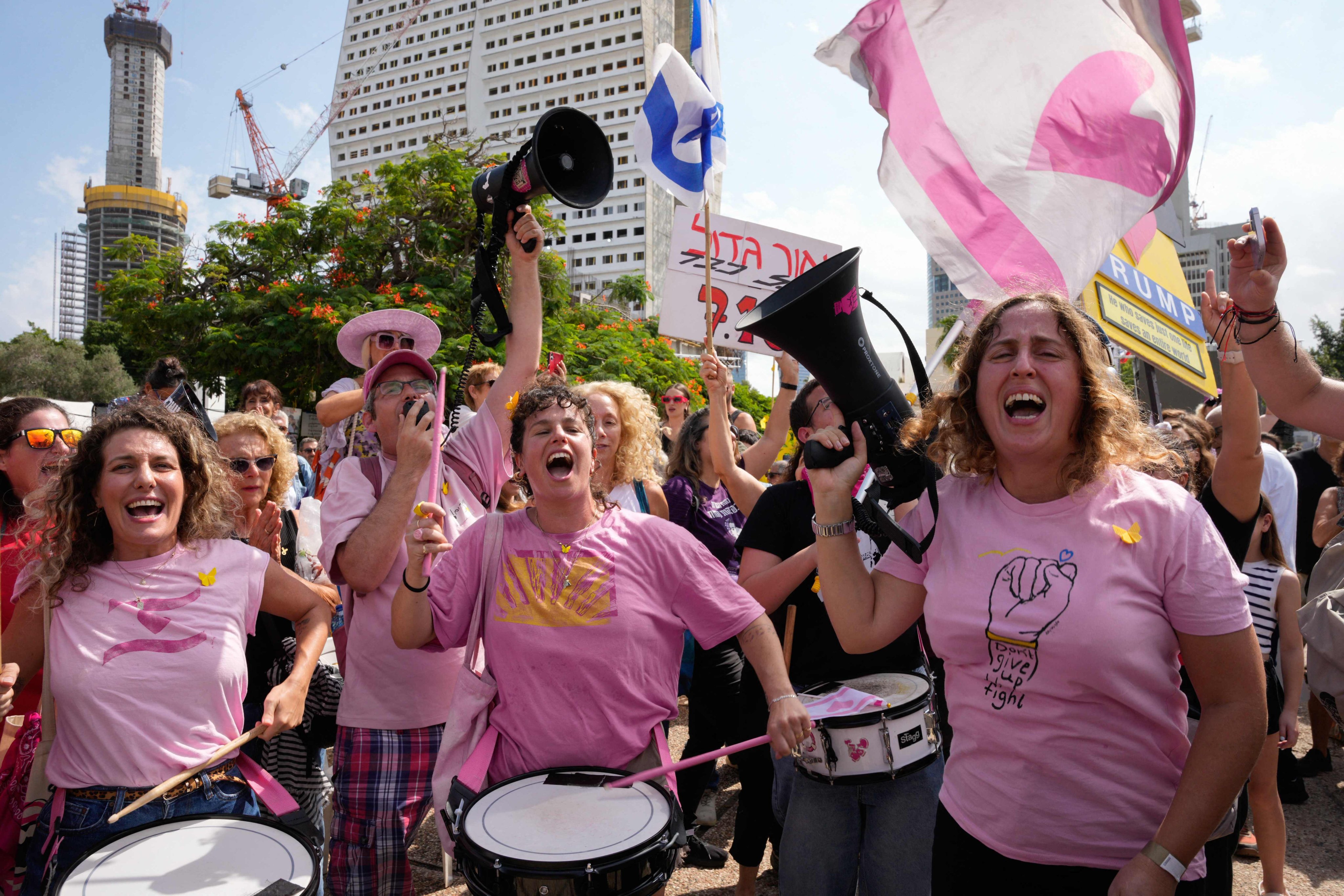 People celebrate at Hostage Square in Tel Aviv on Thursday following the announcement of the new Gaza ceasefire deal. Photo: AFP