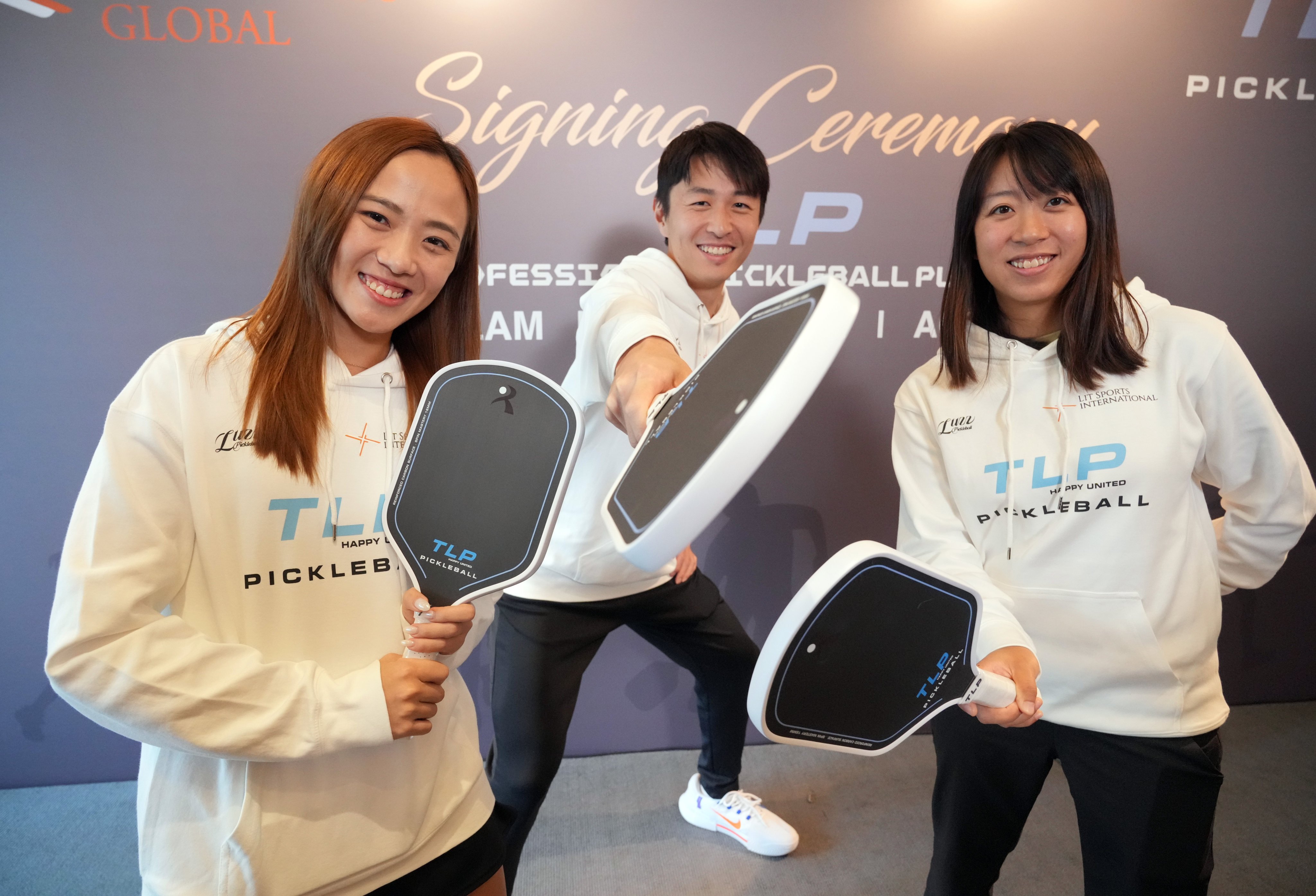 (From left) Agnes Fung, Ryan Lam and Nikita Tang celebrate signing with TLP Pickleball Club at a ceremony at the Conrad Hong Kong. Photo: May Tse