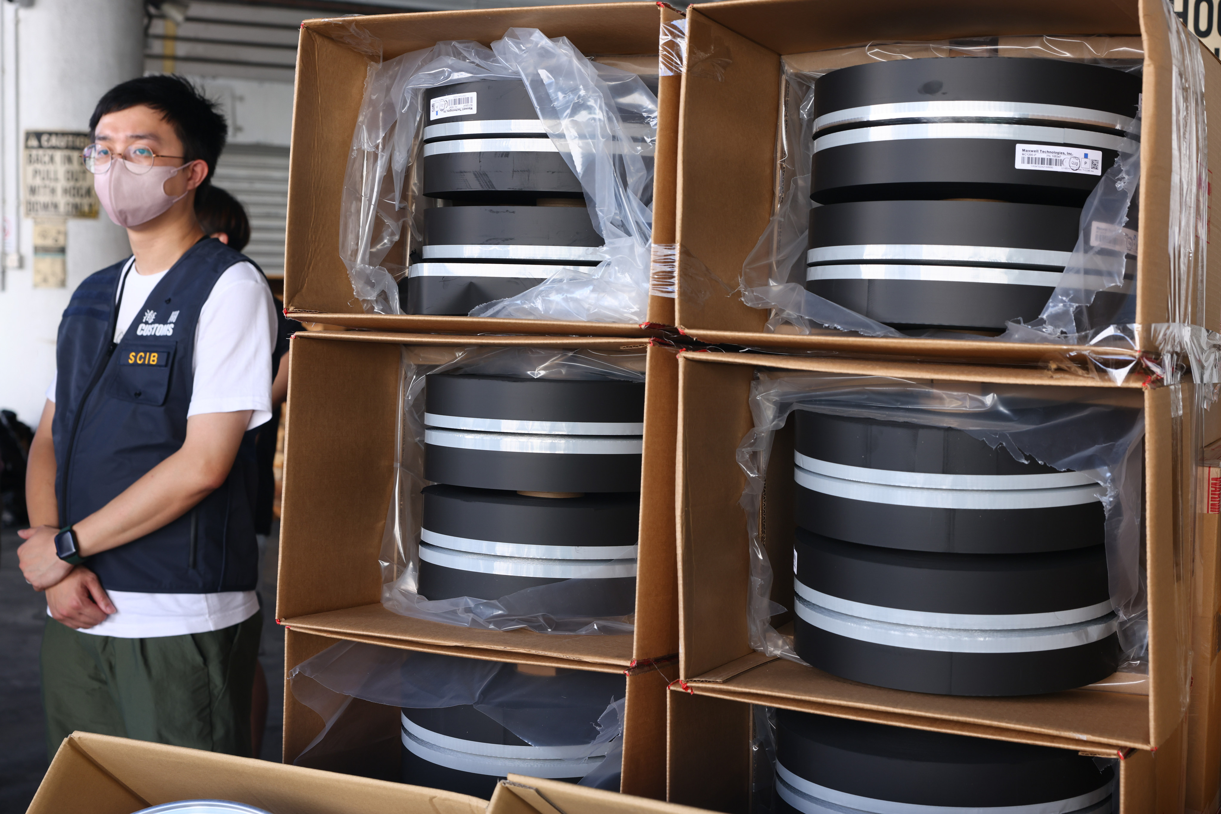 Customs displays raw materials for electric vehicle batteries seized during the operation. Photo: Dickson Lee