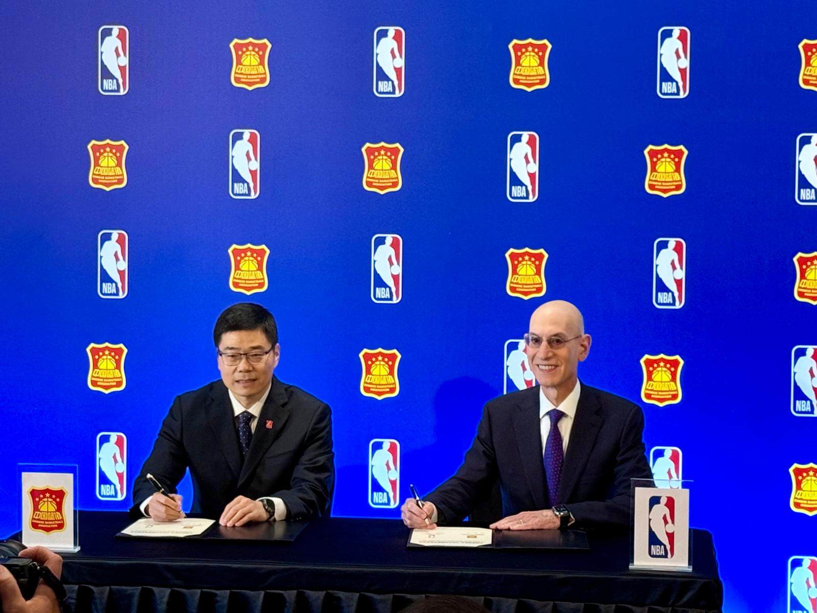 CBA chairman Guo Zhenming (left) and NBA commissioner Adam Silver at the signing ceremony in Macau. Photo: Mike Chan